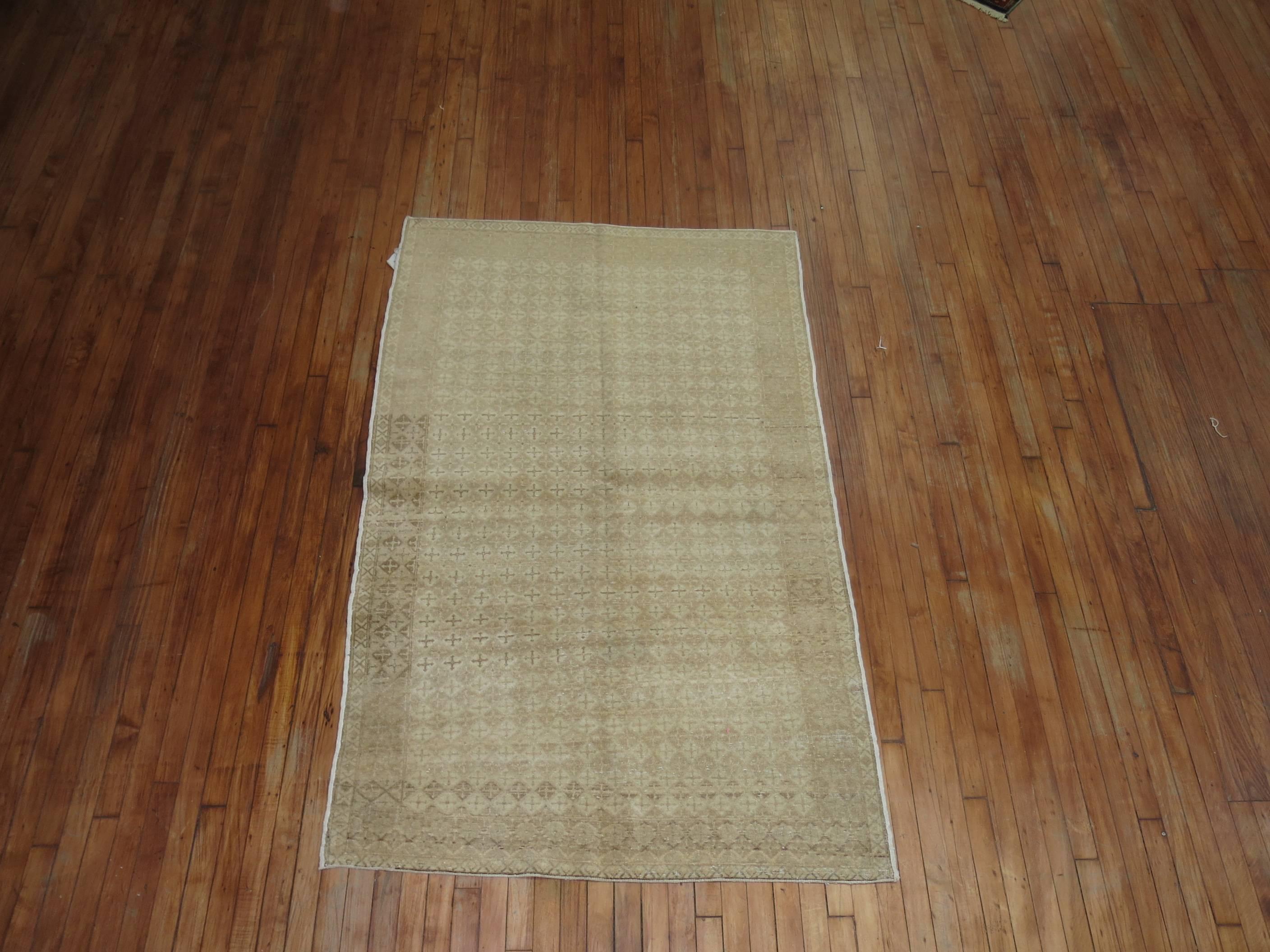 A handmade mid-century Turkish weave in khaki and taupes.

Measures: 4'3'' x 6'8''.
