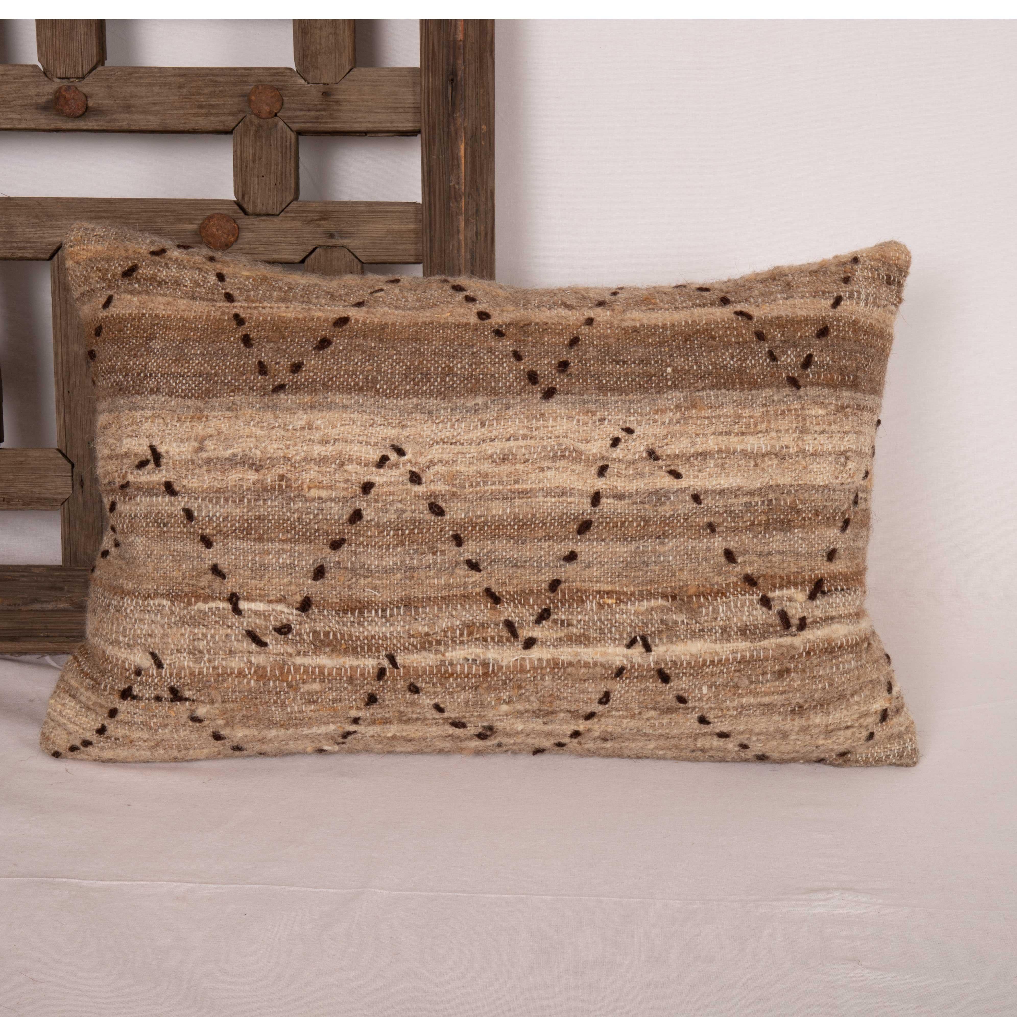The materials this pillowcase is made from purely natural , undyed wool, dating back to mid 20th C.
Embroidered design elements on it are our design and they are purely hand done on the vintage materials.
It does not come with an insert.
Linen in