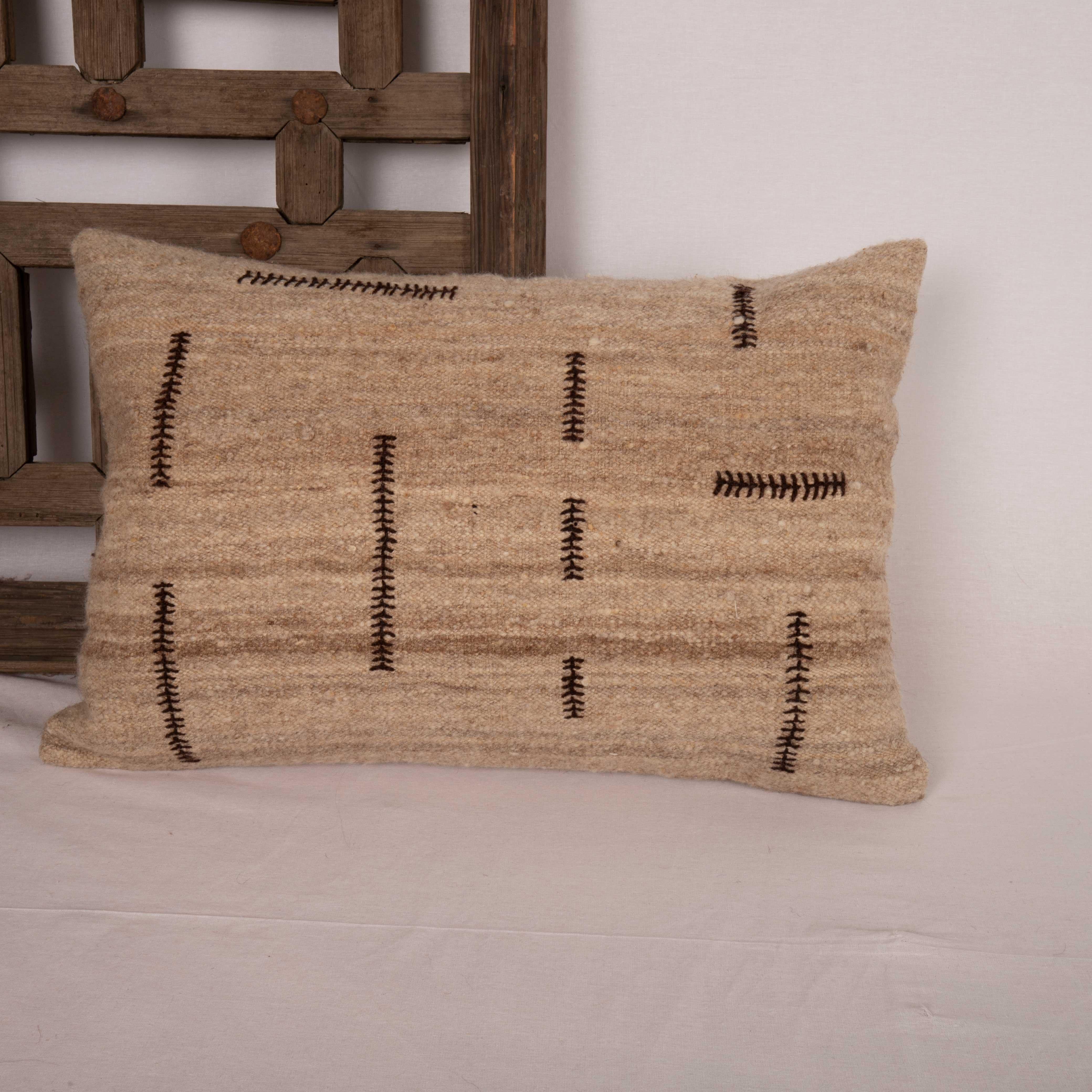 The materials this pillowcase is made from purely natural , undyed wool, dating back to mid 20th C.
Embroidered design elements on it are our design and they are purely hand done on the vintage materials.
It does not come with an insert.
Linen in