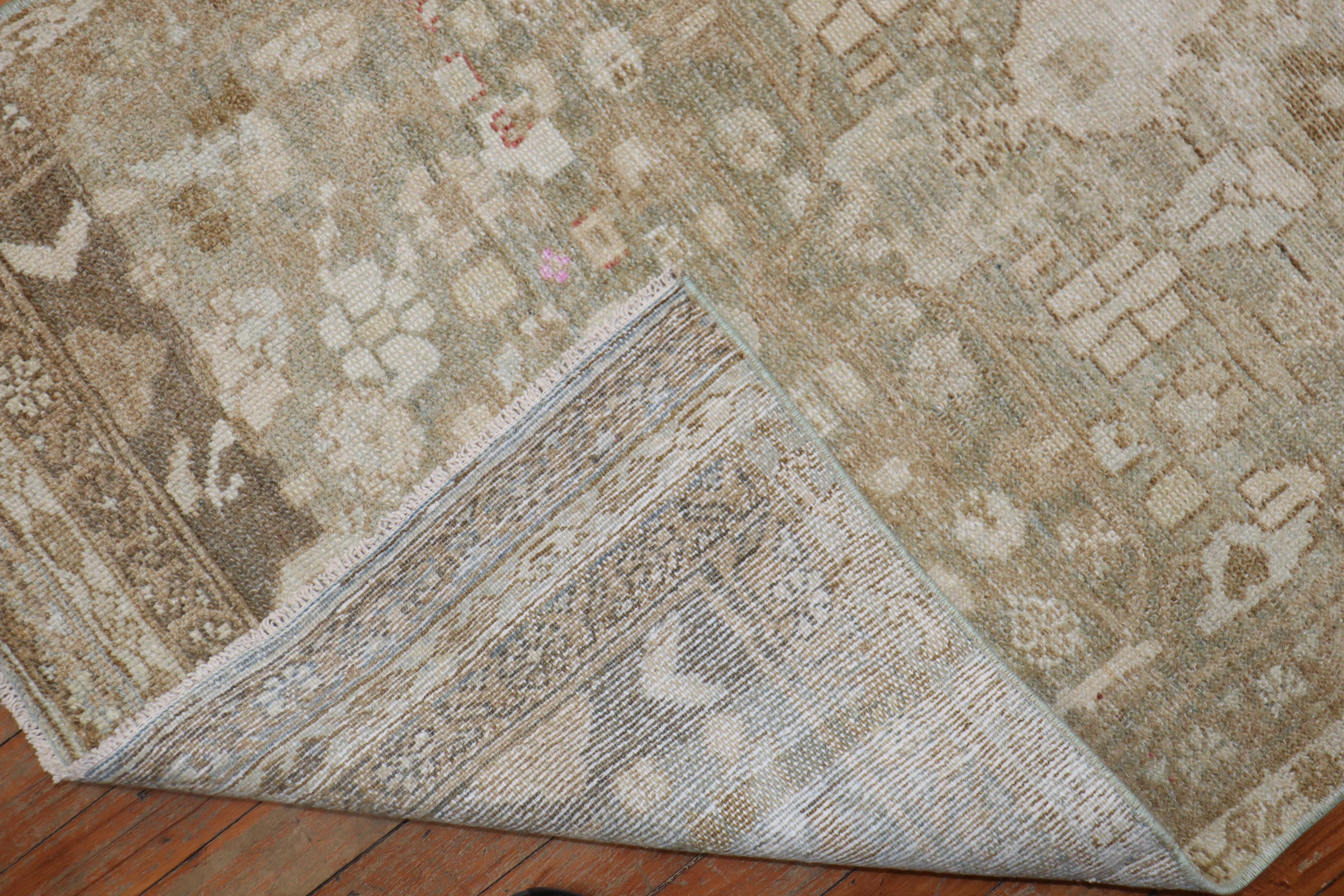 Predominant brown, gray, slate Persian Malayer runner from the early 20th century. Accents in light brown and silver.

Measures: 2'9'' x 8'3