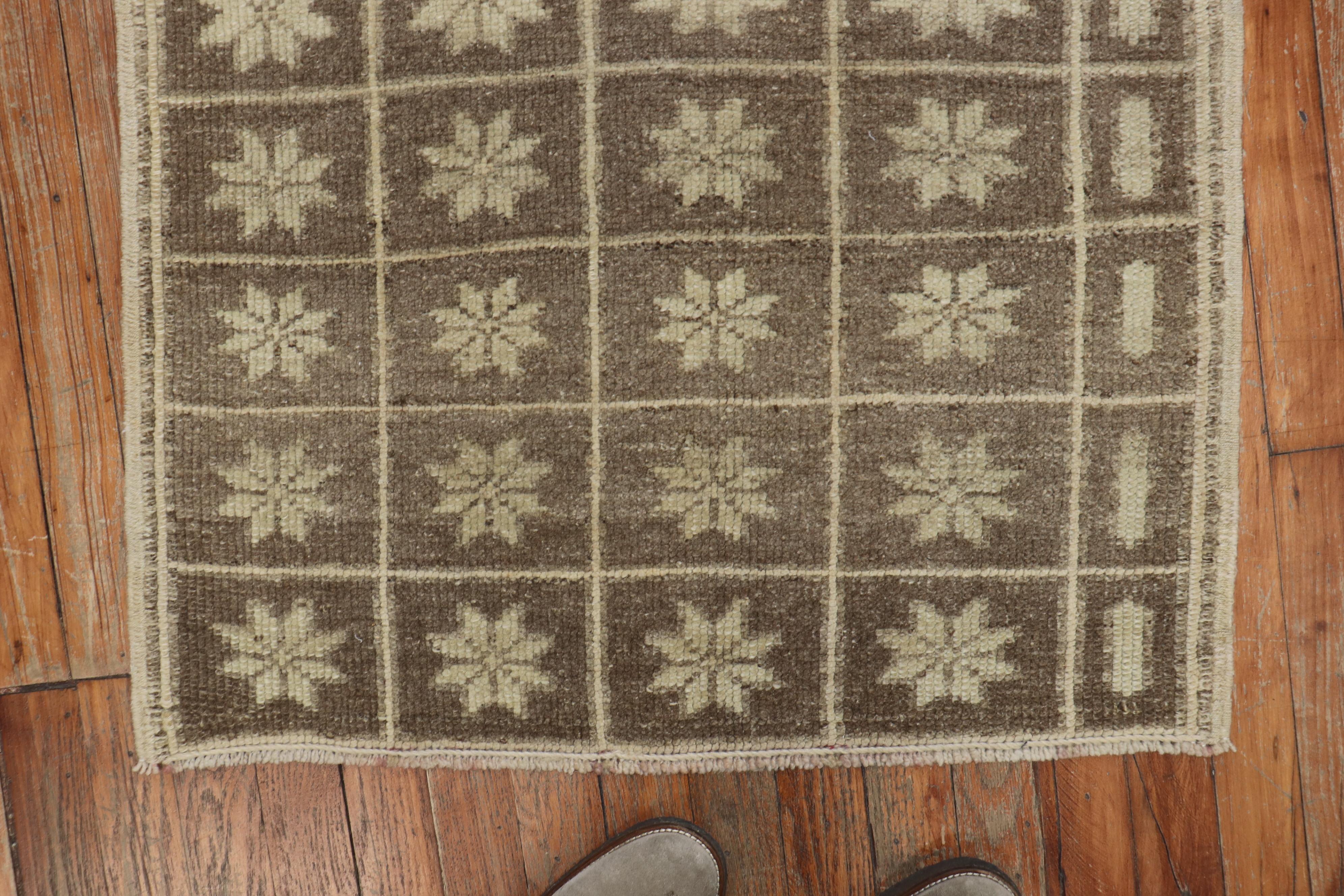 Mid-20th century Turkish fragment rug in neutral colors, predominantly in brown.

Measures: 2'5