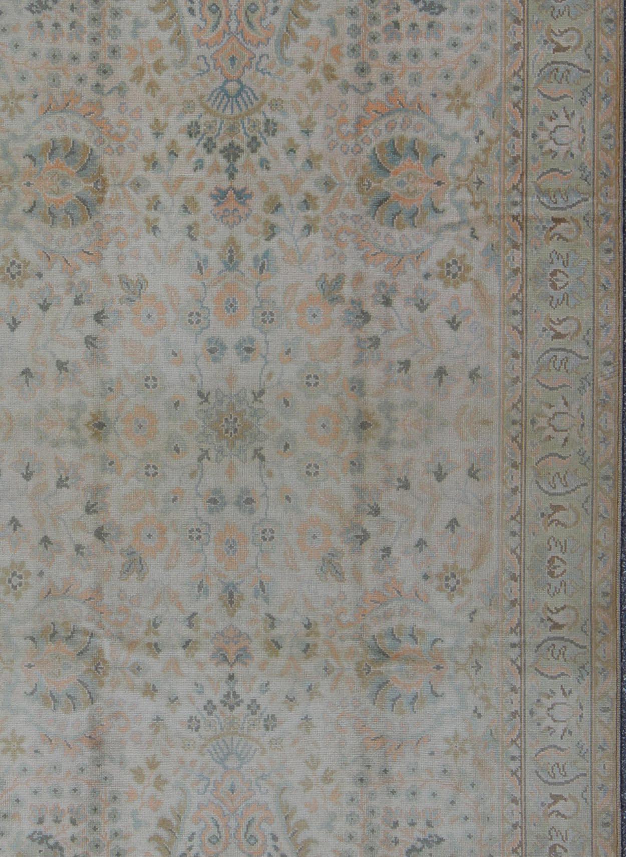 Measures: 6'0 x 9'10

Country of Origin: Turkey; Type: Oushak; Design: All-Over, Floral, Arabesque-Floral; Keivan Woven Arts: rug tu-vey-46011; Neutral Vintage Turkish Oushak Rug with Floral Design and Medallions in Wool; Persian Rug, Vintage