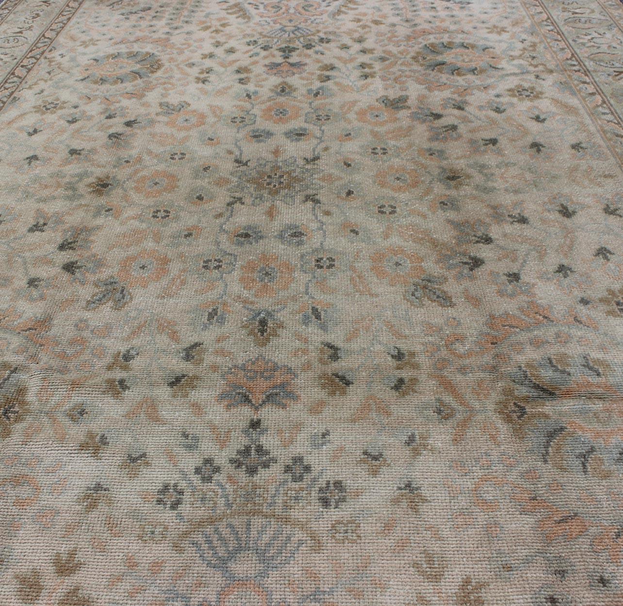 Wool Neutral Vintage Turkish Oushak Rug with Floral Design and Repeated Floral Motifs For Sale