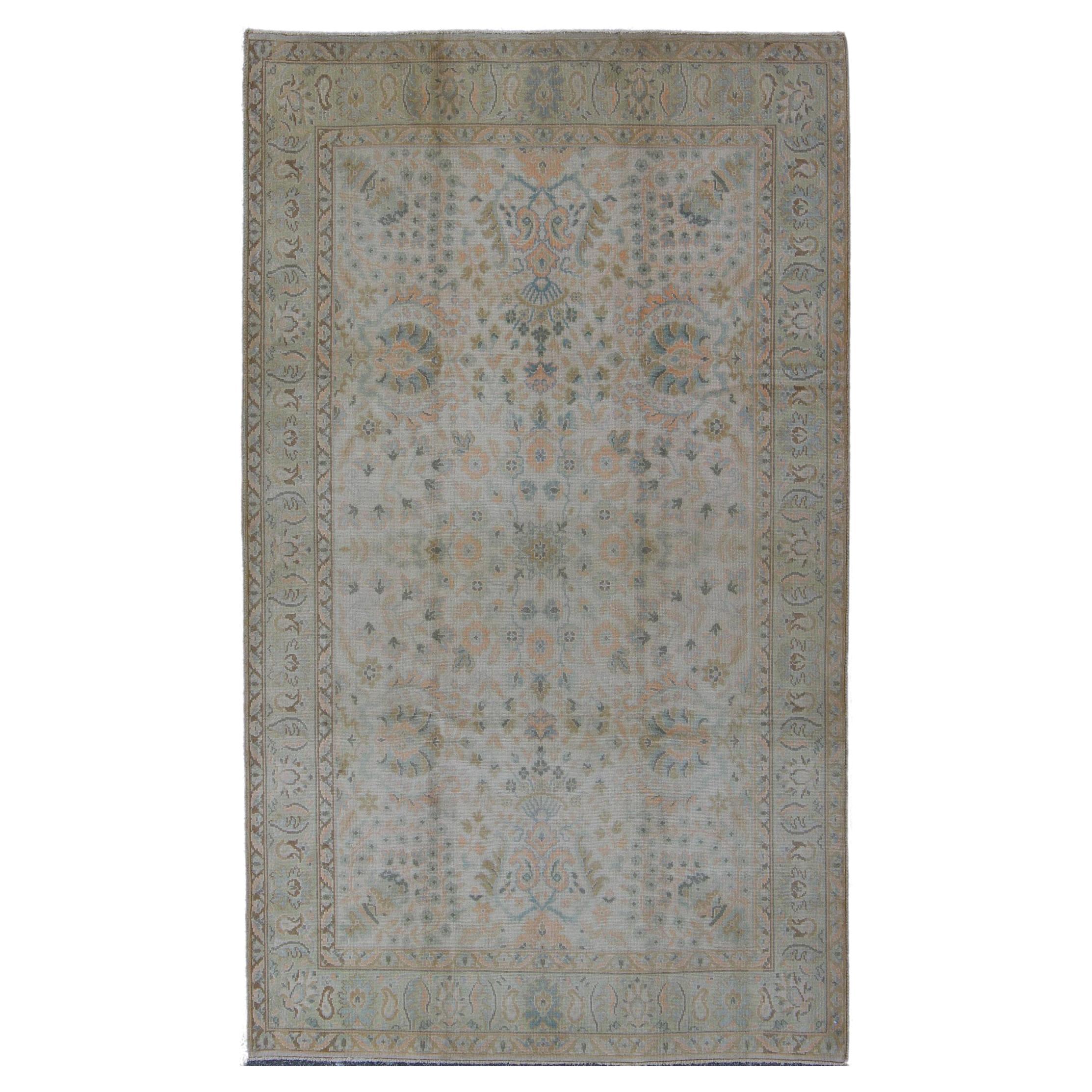 Neutral Vintage Turkish Oushak Rug with Floral Design and Repeated Floral Motifs For Sale