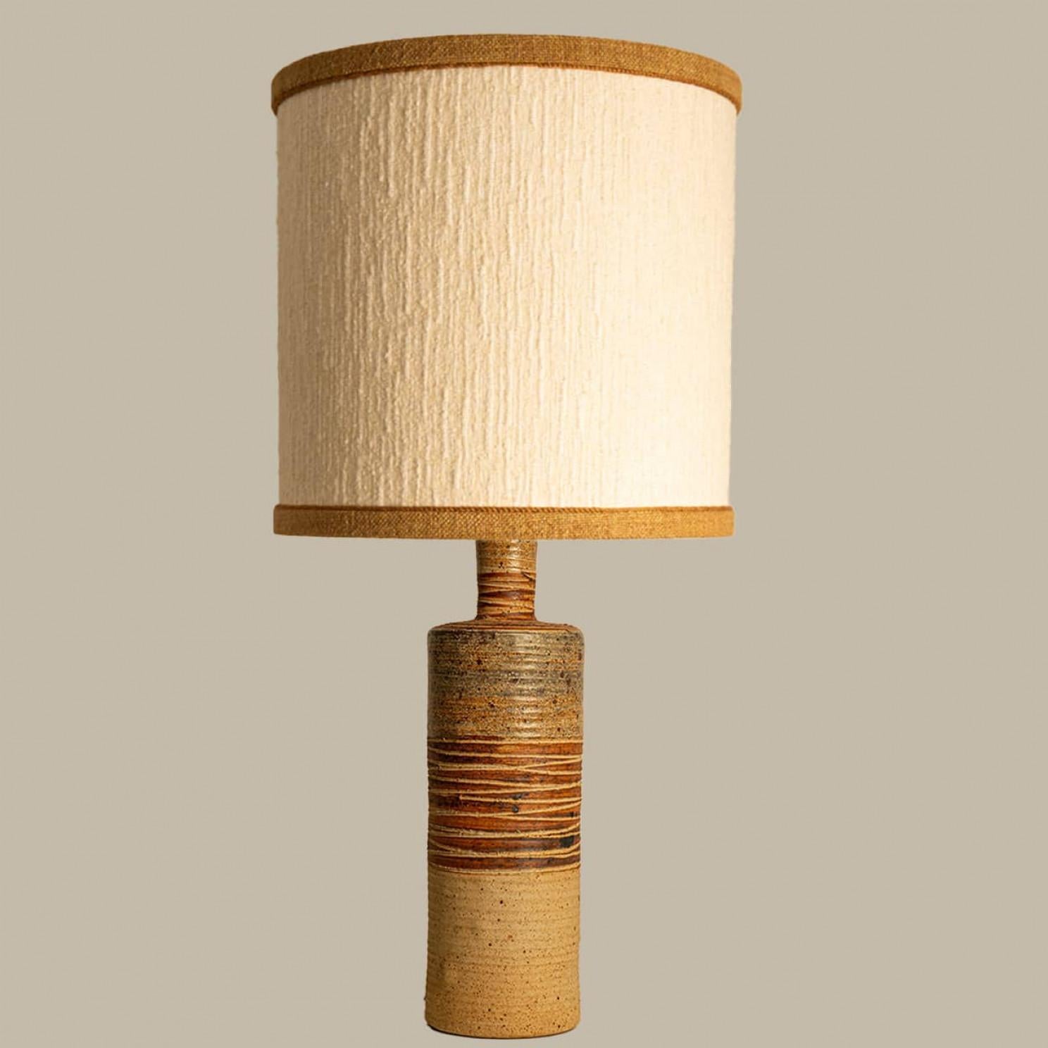 Heavy quality and extra large ceramic table or floor lamp by Tue Poulsen for Tue Keramik, 1960s Denmark.

This lamp base brings refined elegance and rich visual appeal to any interior. With its beautiful shape and texture, it offers a unique