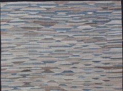 Kilim moderno con geometrie in  Variazione di toni blu, marrone, marrone scuro e neutro
