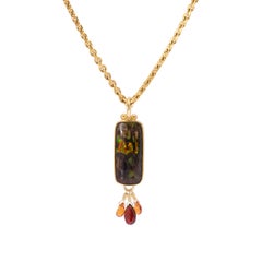 Nevada Wood Opal Pendant with Garnet and Sapphire Briolettes in 22k and 18k Gold