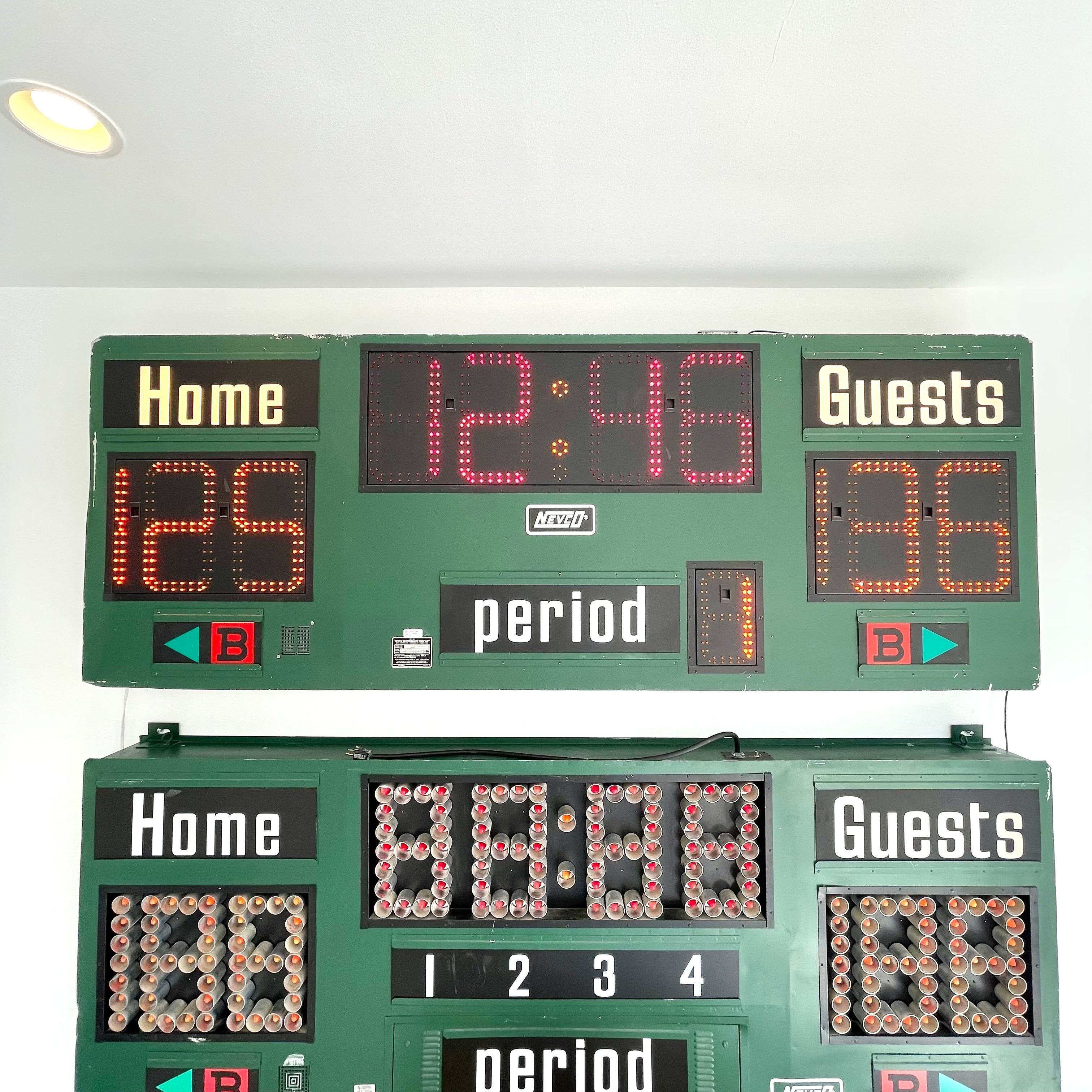 Fantastic green metal LED scoreboard by Nevco. Made in the early 2000s in the US. Can be used for multiple sports. 100% functional and gone through. Running clock, guest and home score and bonus. The entire board runs off LED lights. One of the