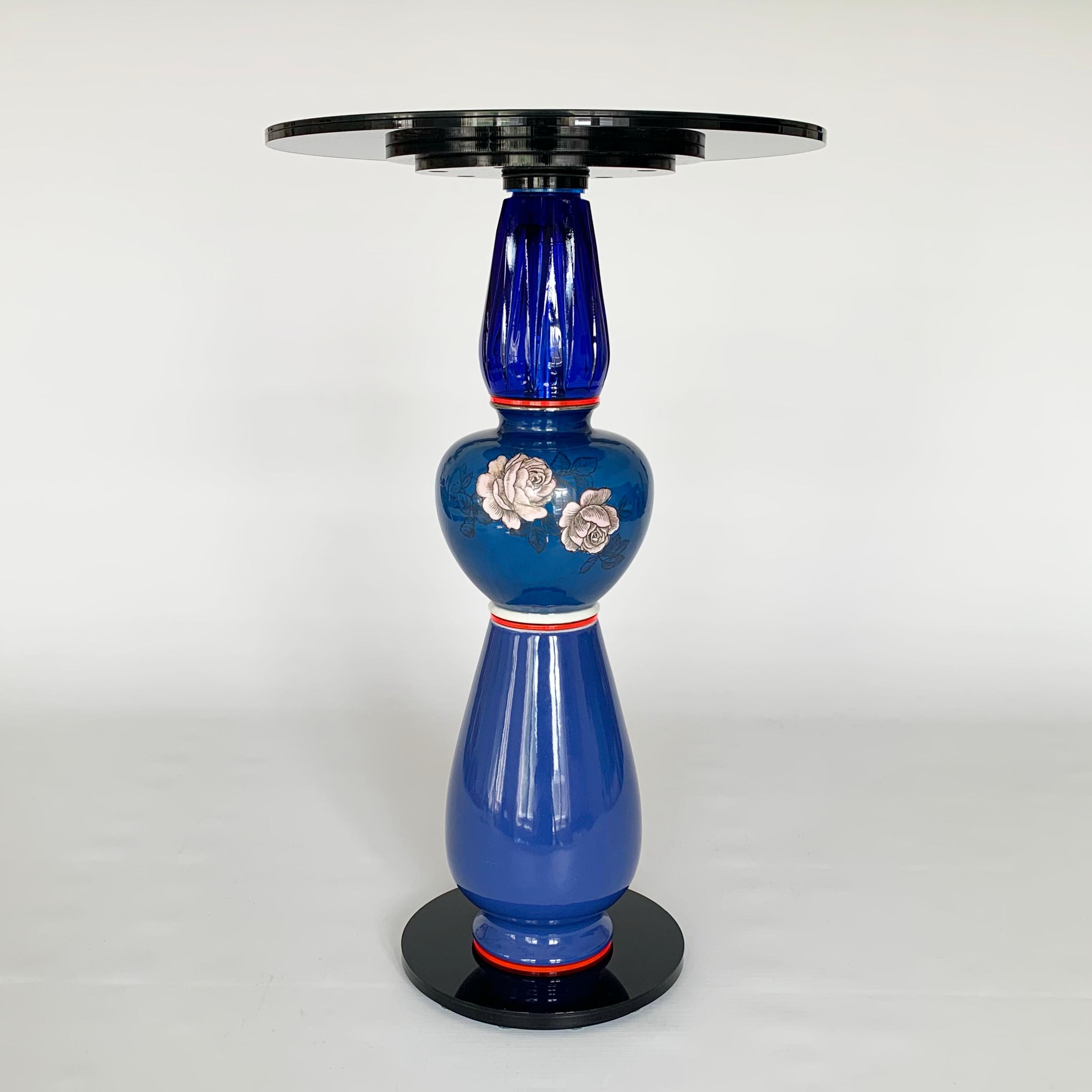 Designer and Artis Andreas Berlin created a collection of extraordinary side tables. This tables are sculptures and high end useful upcycling tables. The vases found in antiquarian stores become a new life as a segment of a sculpture. A clever