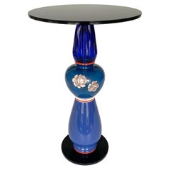 Table d'appoint vintage « Never before » en porcelaine et plateau en verre 