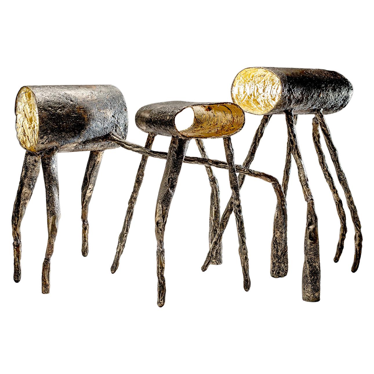 Never Less Alone Than When Alone Stools in Bronze by Gregory Nangle