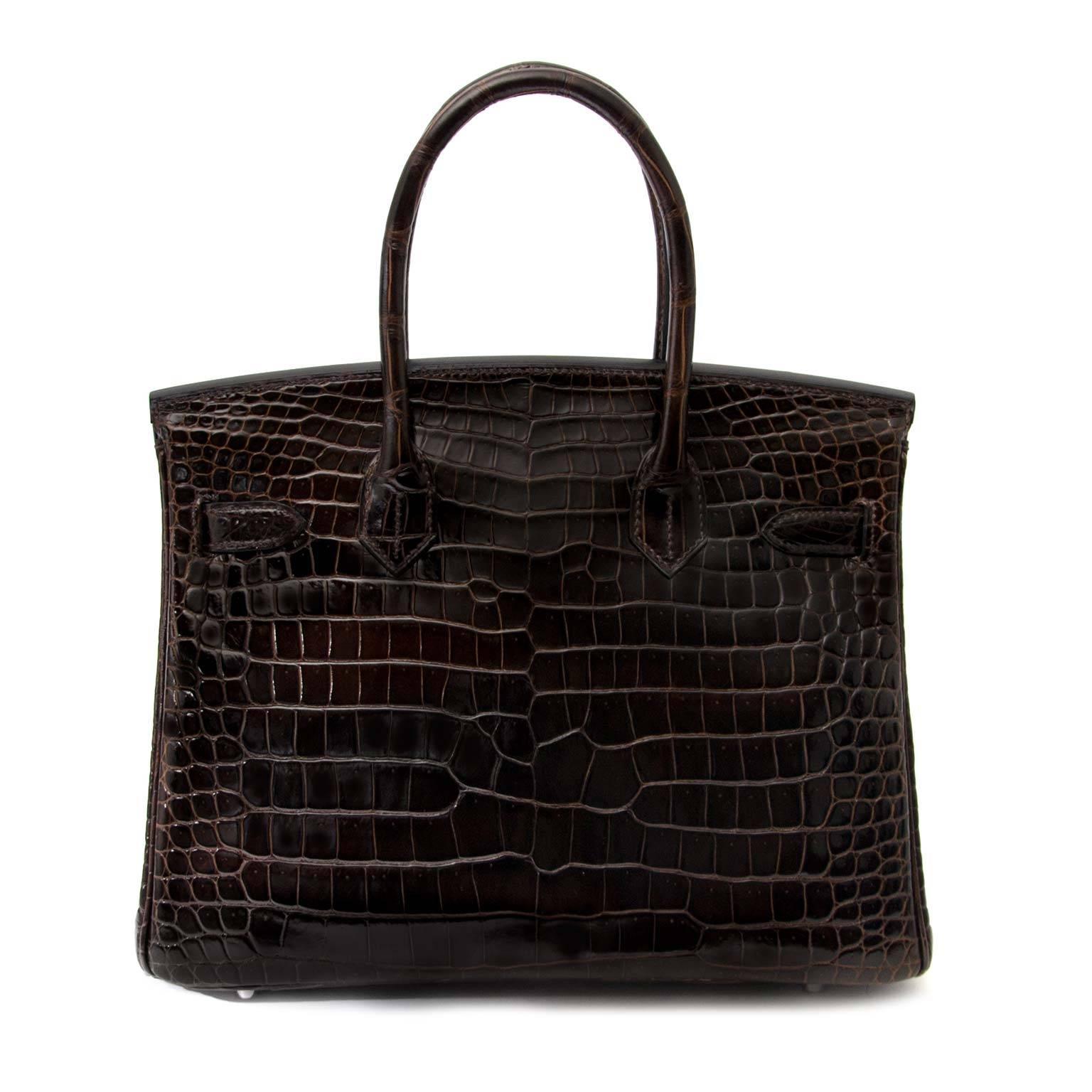 Never used , full set 

Hermès Birkin 30 Croco Porosus Lisse Havane PHW

This extremely rare and precious Hermès Birkin 30 Croco Porosus Lisse in timeless Havane color truly is the height of luxury. Its super chique hue is the perfect shade of brown