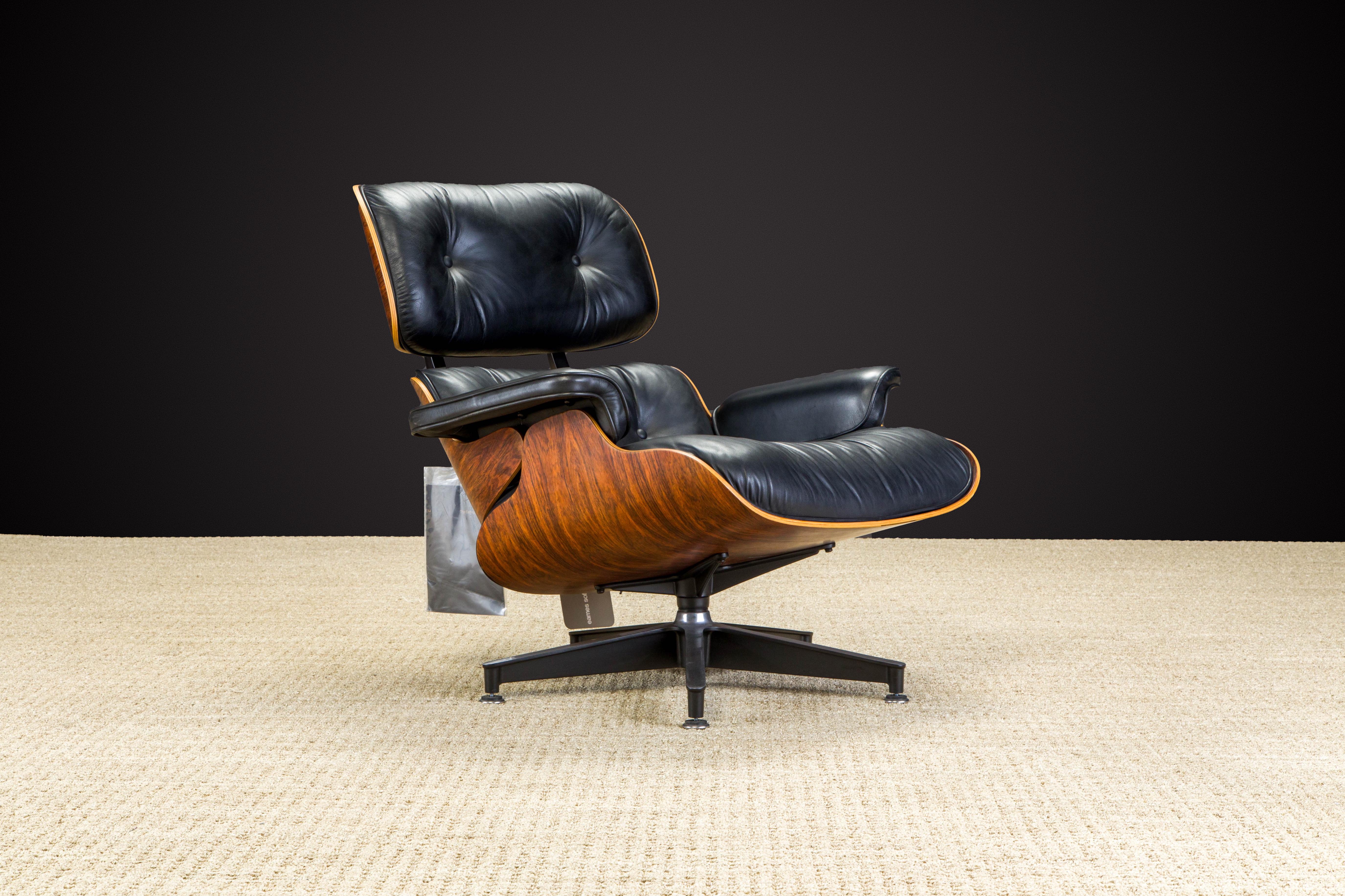 This is a unique and an incredible opportunity for a collector to acquire a very special never-used example of the Eames Lounge Chair (model #670) in classic black leather and Rosewood shell (frame). This particular chair was owned for the past
