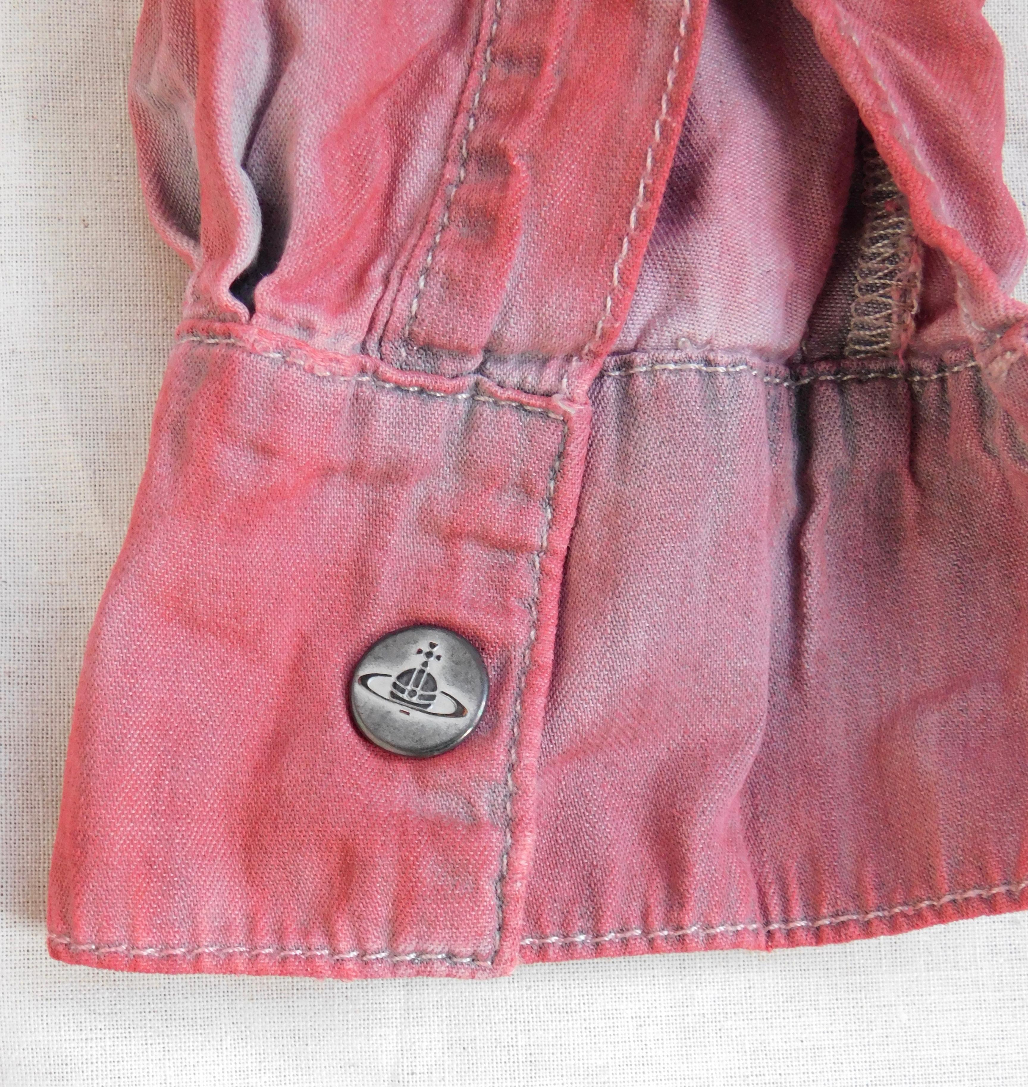 Jumpsuit shorts made by Vivienne Westwood Anglomania as a limited capsule collection for Lee Jeans. Soft grey cotton  over dyed in red creates a cool mottled vintage look. Never worn with the Original label .
Can be worn low on the hip or belted at