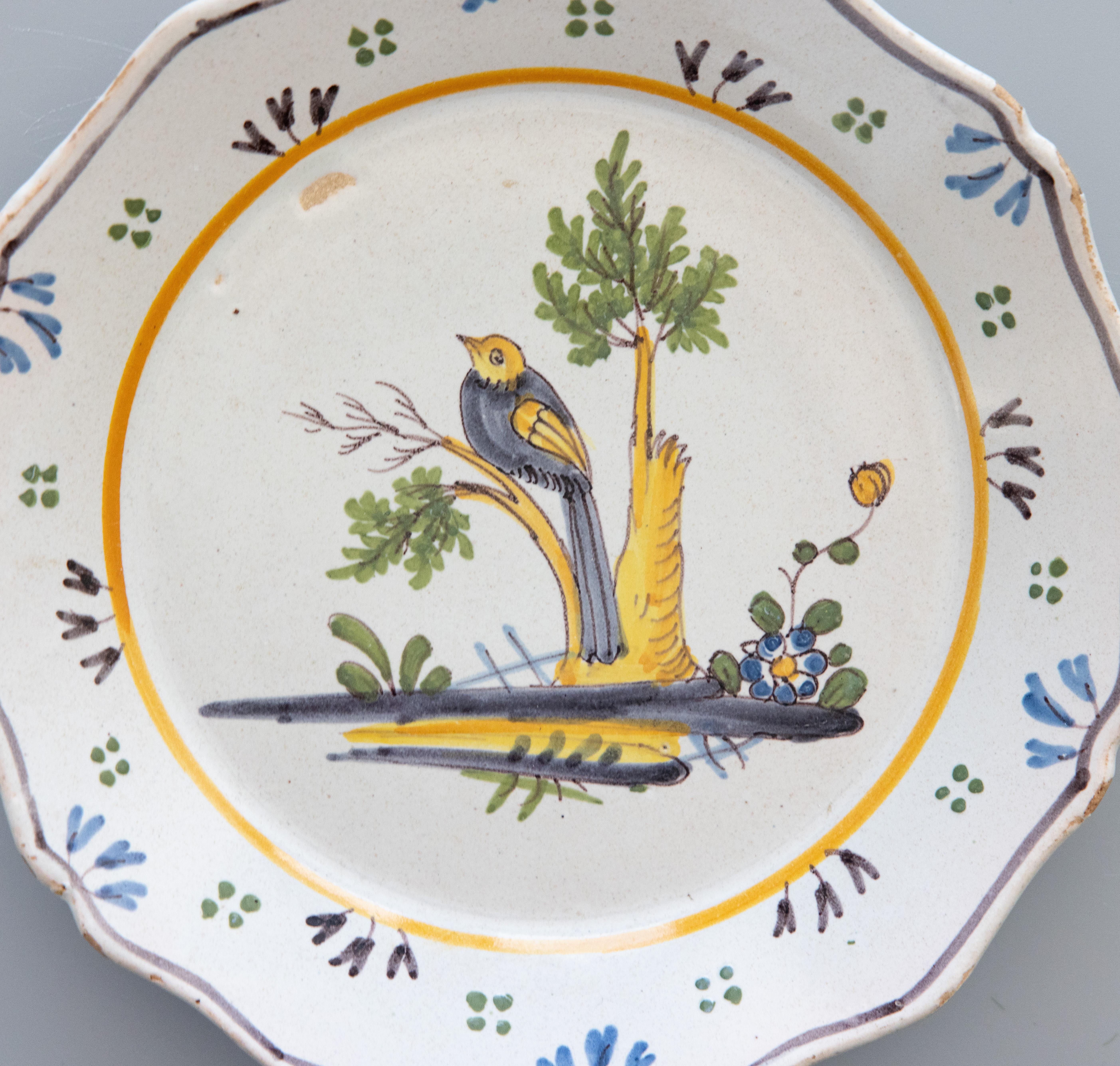 Fired 18th Century French Nevers Polychrome Tin-Glazed Faïence Bird Plate For Sale