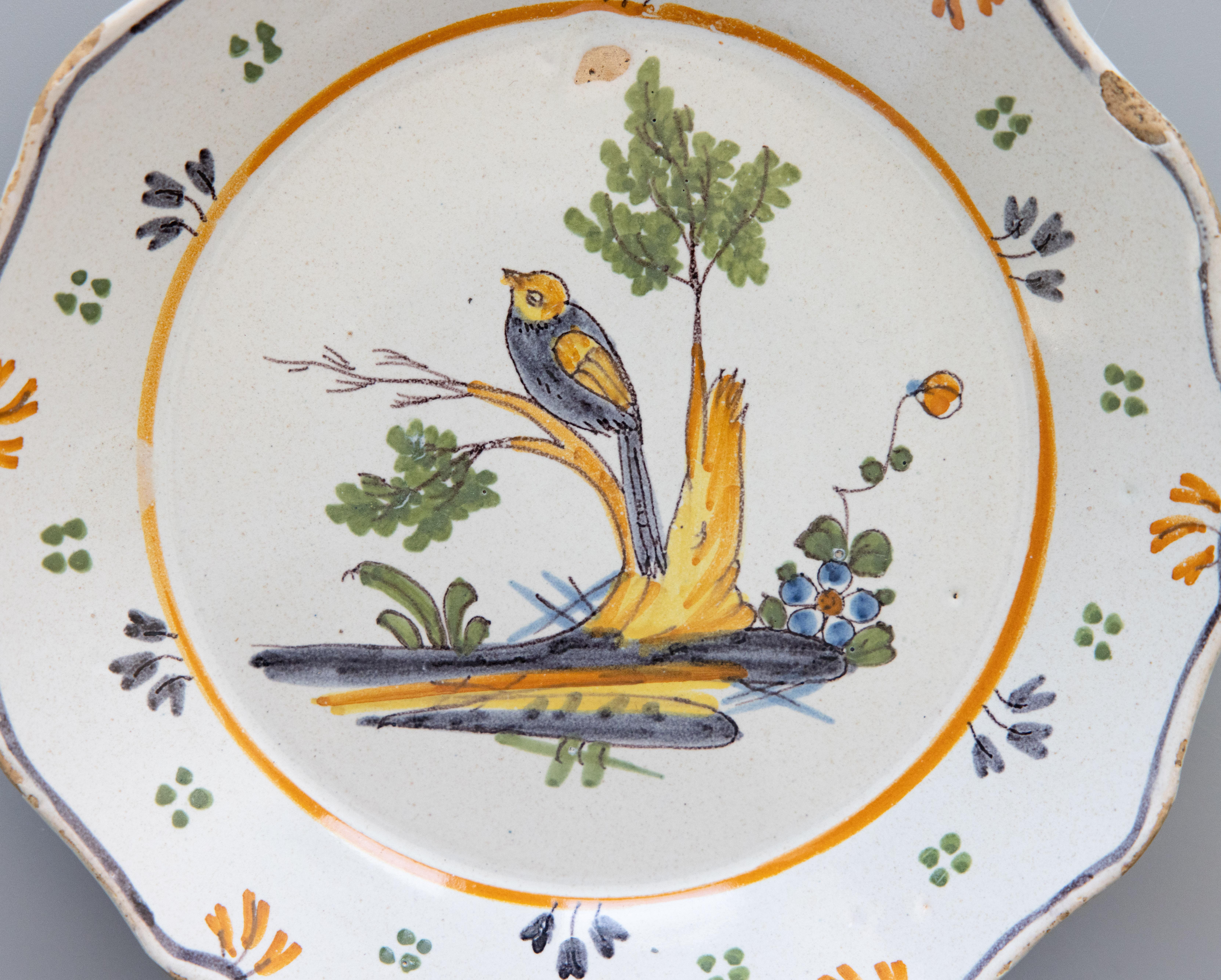 Fired 18th Century French Nevers Polychrome Tin-Glazed Faïence Bird Plate For Sale