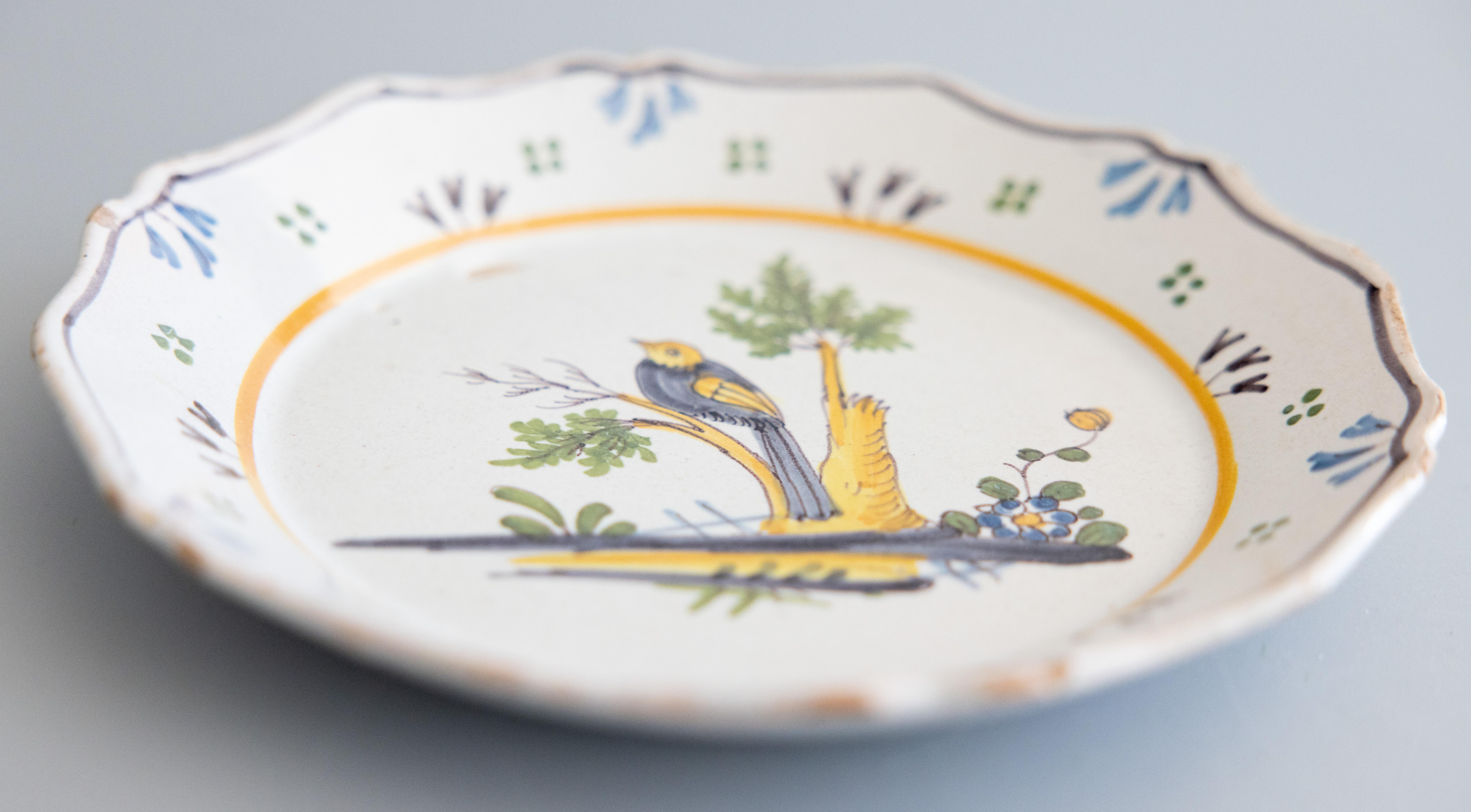 Faience 18th Century French Nevers Polychrome Tin-Glazed Faïence Bird Plate For Sale