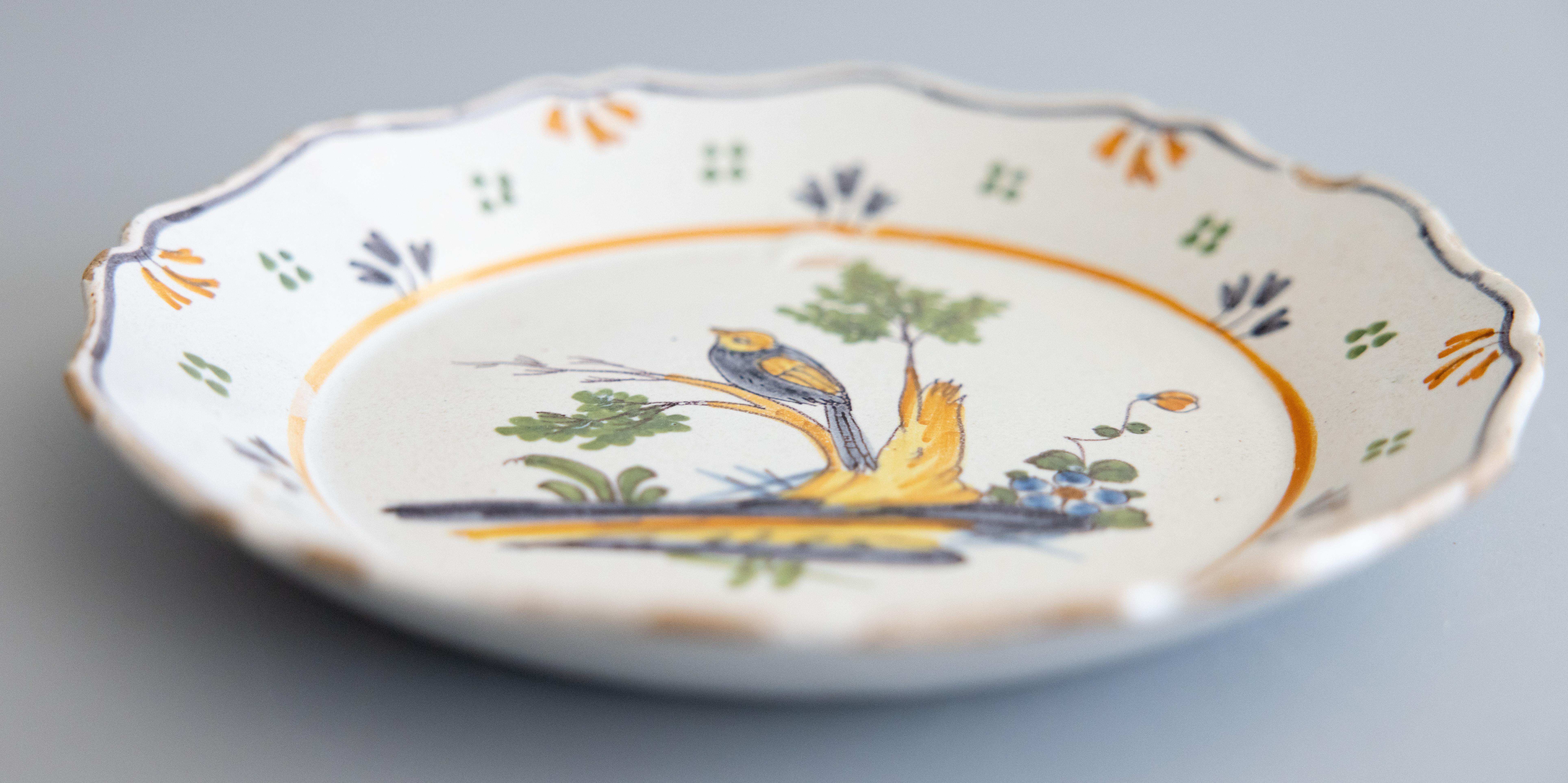 Faience 18th Century French Nevers Polychrome Tin-Glazed Faïence Bird Plate For Sale