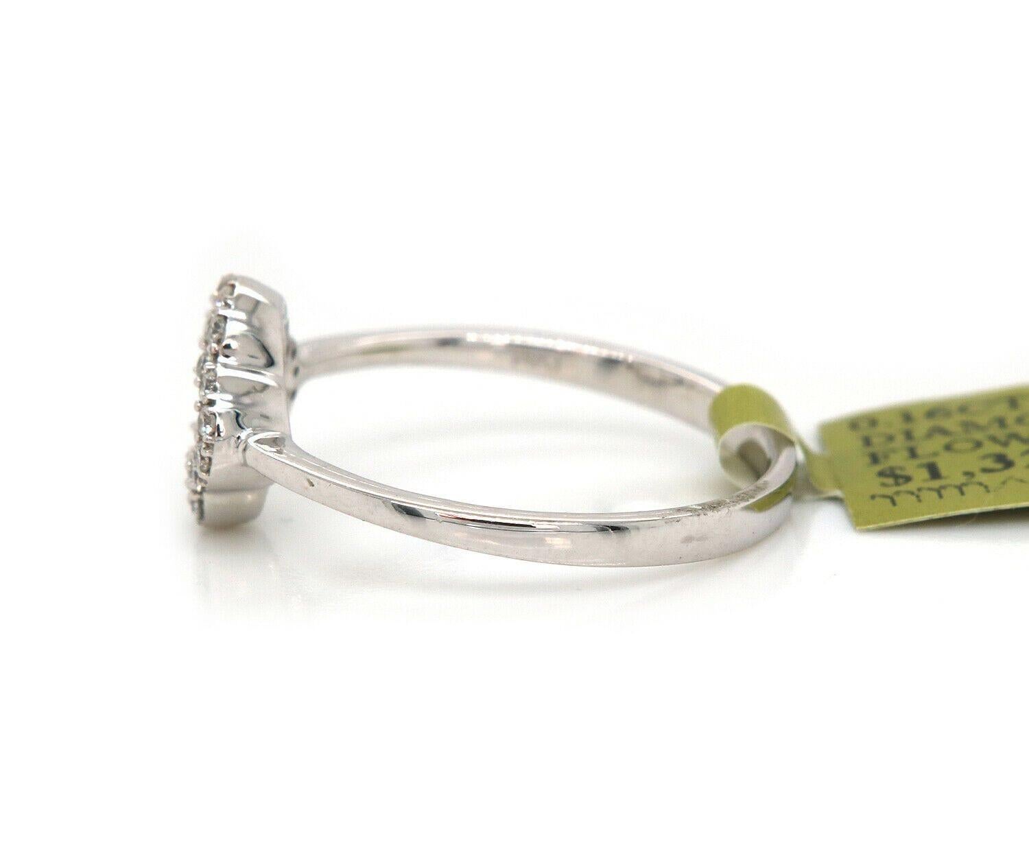 Neu 0,16ctw Diamond Open Quatrefoil Ring in 14K

Offener vierblättriger Diamantring
14K Weißgold
Karatgewicht der Diamanten: Ca. 0,16ctw
Ringgröße: 6.75 (US)
Gewicht: Ca. 2,20 Gramm
Gestempelt: 14KT

Zustand:
Angeboten für Ihre Betrachtung ist eine