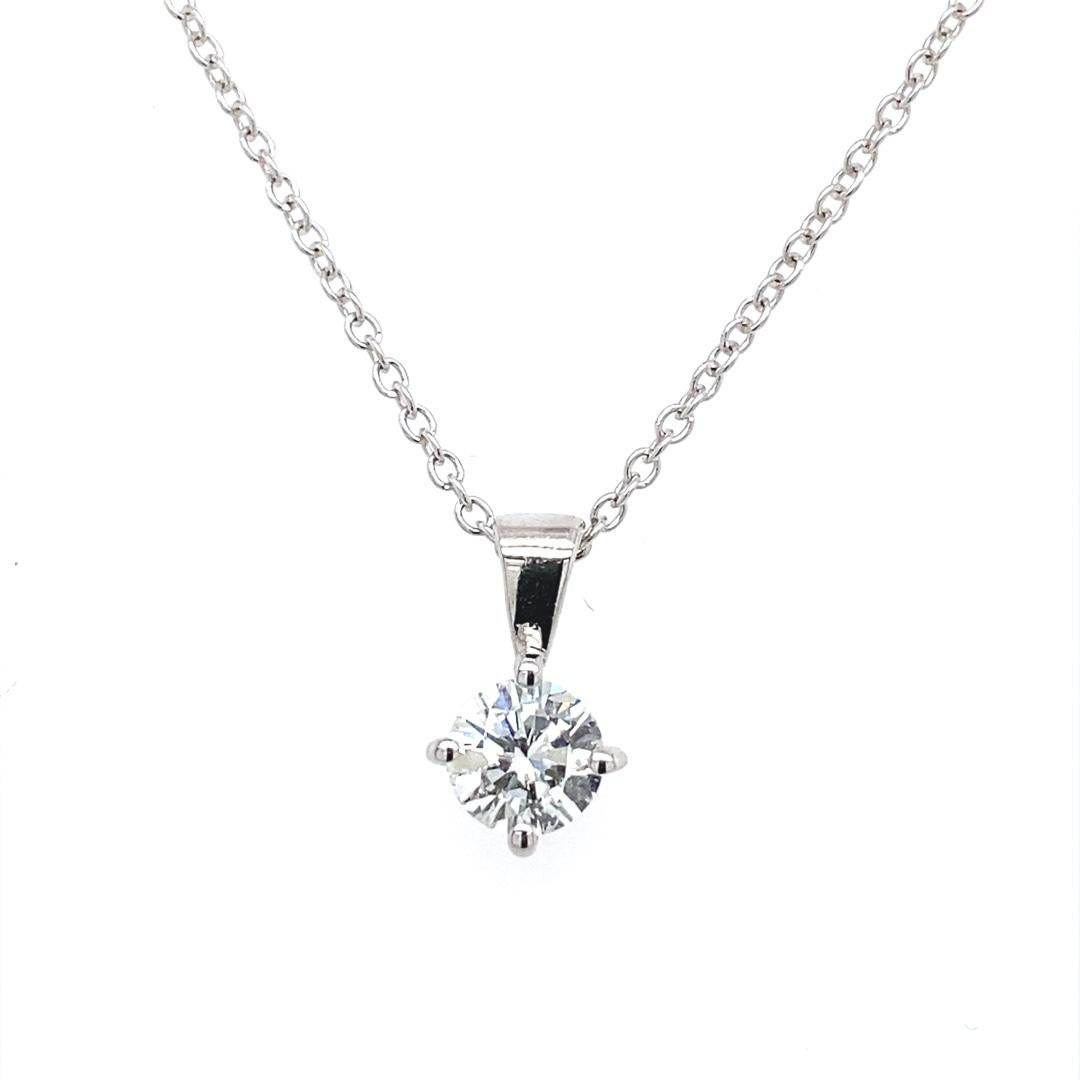 Set In 18ct White Gold On 16/18″ Chain.

Additional Information:
Diamond Weight: 0.35ct
Diamond Colour: G
Diamond Clarity: SI
Total Weight: 2g
Chain Length: 16