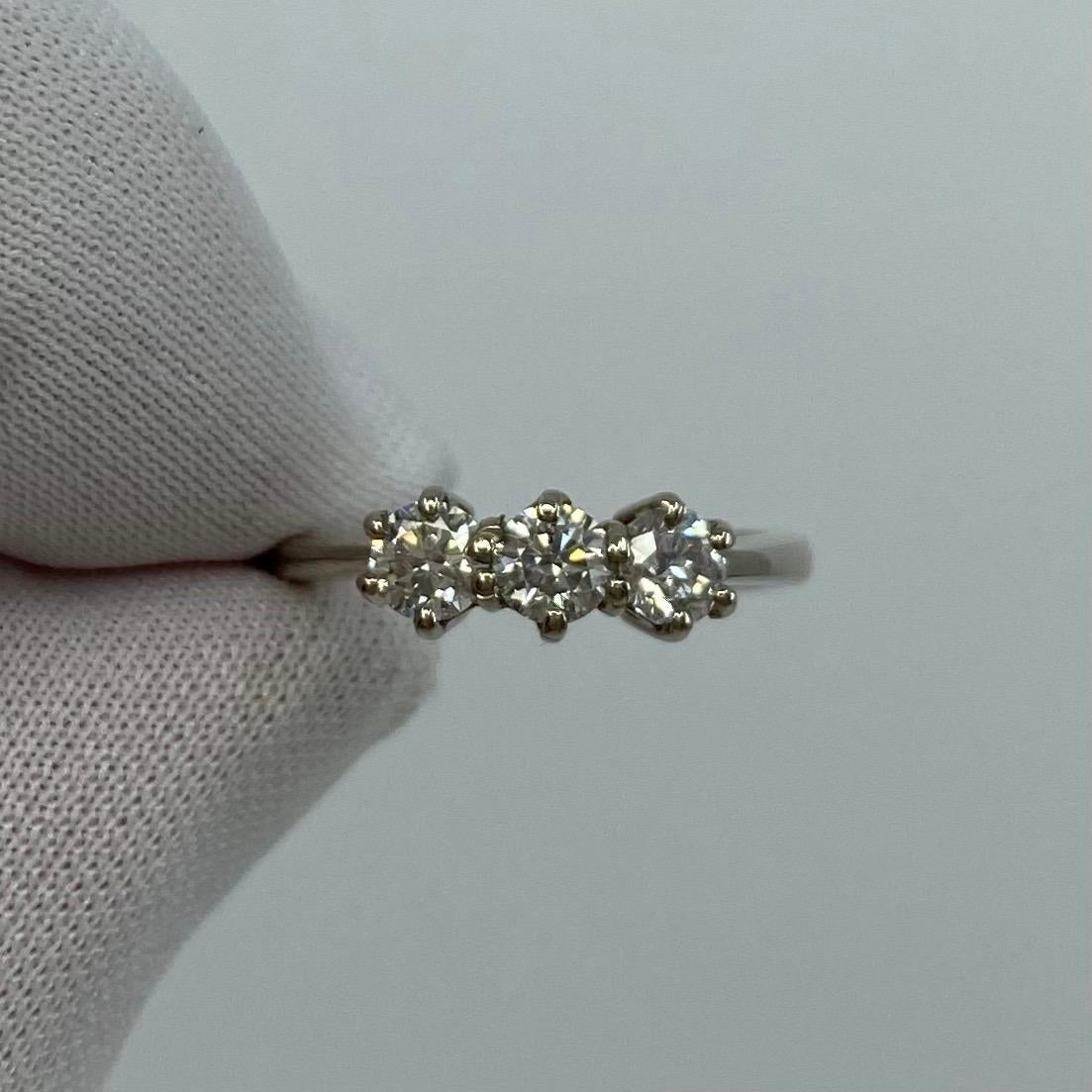 18k White Gold Diamond Three Stone Ring.

A stunning 18k white gold diamond ring set with 3 beautiful white diamonds.
The diamonds are approx Si1-Si2 Clarity and G/H Colour. 0.75ct total weight. 0.25 carat each stone.
All have an excellent round