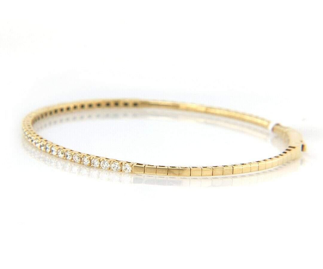 Neu 0,93ctw Diamant Flexible Armreif Armband in 14K

Flexibler Diamant-Armreif
14K Gelbgold
Karatgewicht der Diamanten: Ca. 0,93ctw
Breite des Armbands: ca. 2,0 MM
Größe des Armbands: Ca. 6,75 Zoll
Gewicht: Ca. 5,21 Gramm
Gestempelt: