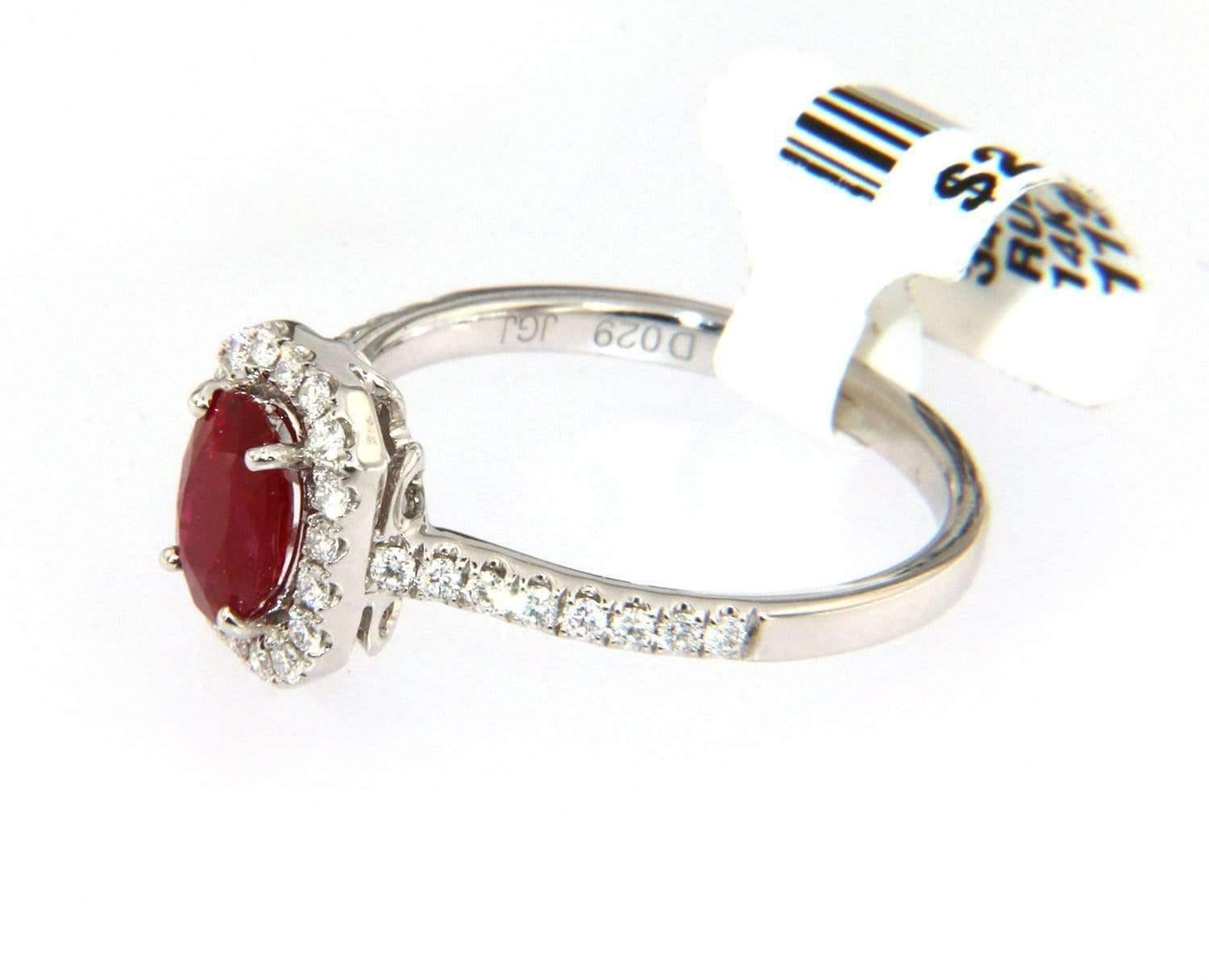 New 0.94 CT Ruby Ring with Diamond Halo in 14K

Ruby & Diamond Ring
14K White Gold
Ruby Weight: approx. 0.94 Ct
Diamond Weight: approx. 0.29 CTW
Ring Size: 6.75 (US)
Weight: approx. 2.9 Grams
Stamped: 14K, 585

Condition:
Offered for your