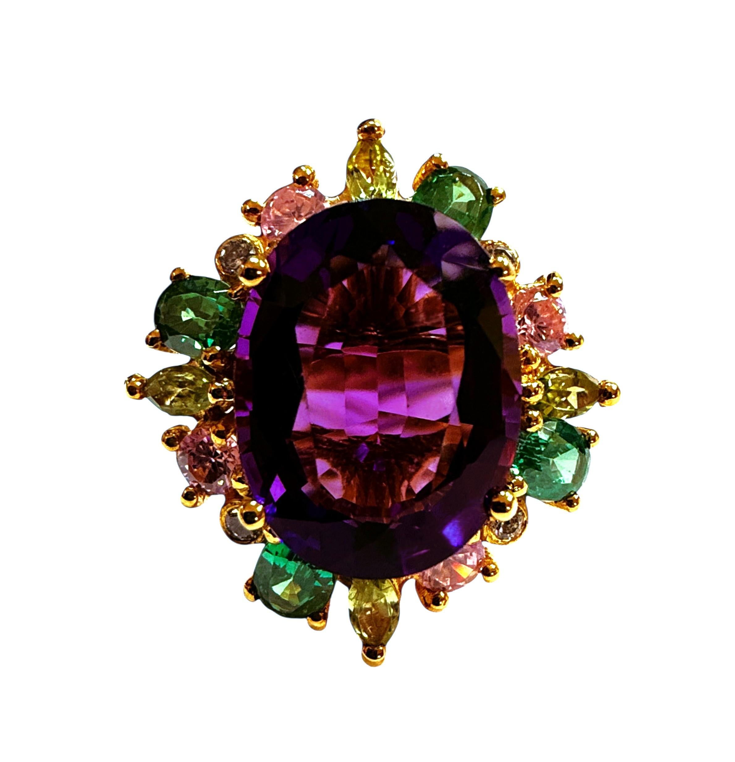 This is just a show-stopper of a ring!  It is a fancy oval cut Amethyst and is 10.70 carats.  It is surrounded by diamond cut purple, pink and blue sapphires and also has 4 larger green sapphire stones and marquise light green sapphire on the halo