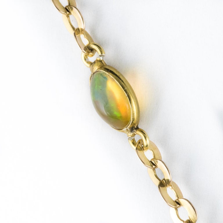 New 12, 1 Carats Peridot Pendant Chain Set with Opals Necklace For Sale