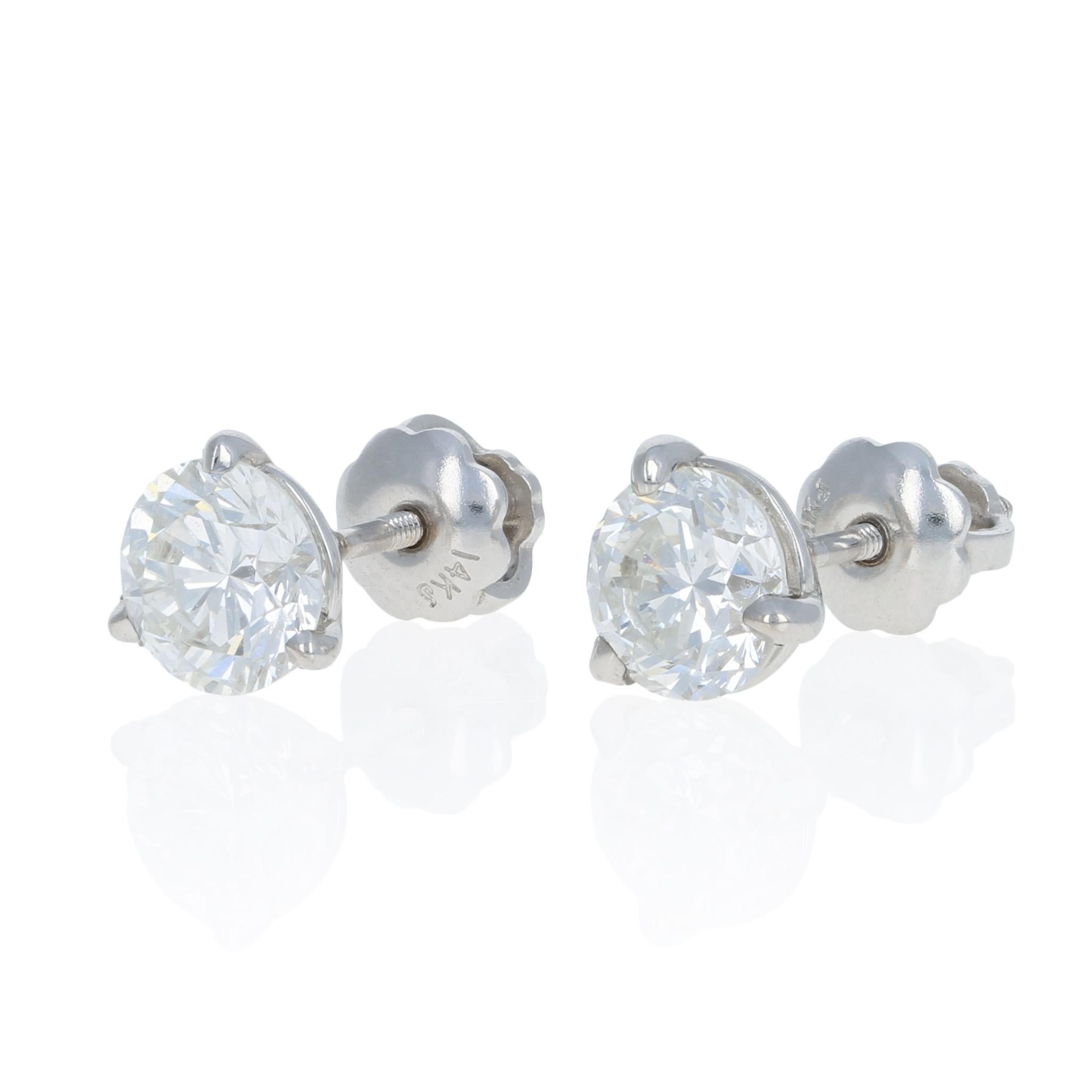 Metal Content: Guaranteed 14k Gold as stamped

Stone Information:
Natural Diamonds  
Clarity: SI1 - SI2 
Color: G - H  
Cut: Round Brilliant
Total Carats: 1.23ctw

Style: Stud
Fastening Type: Pierced Screw-On Closures
Measurements: 1/4