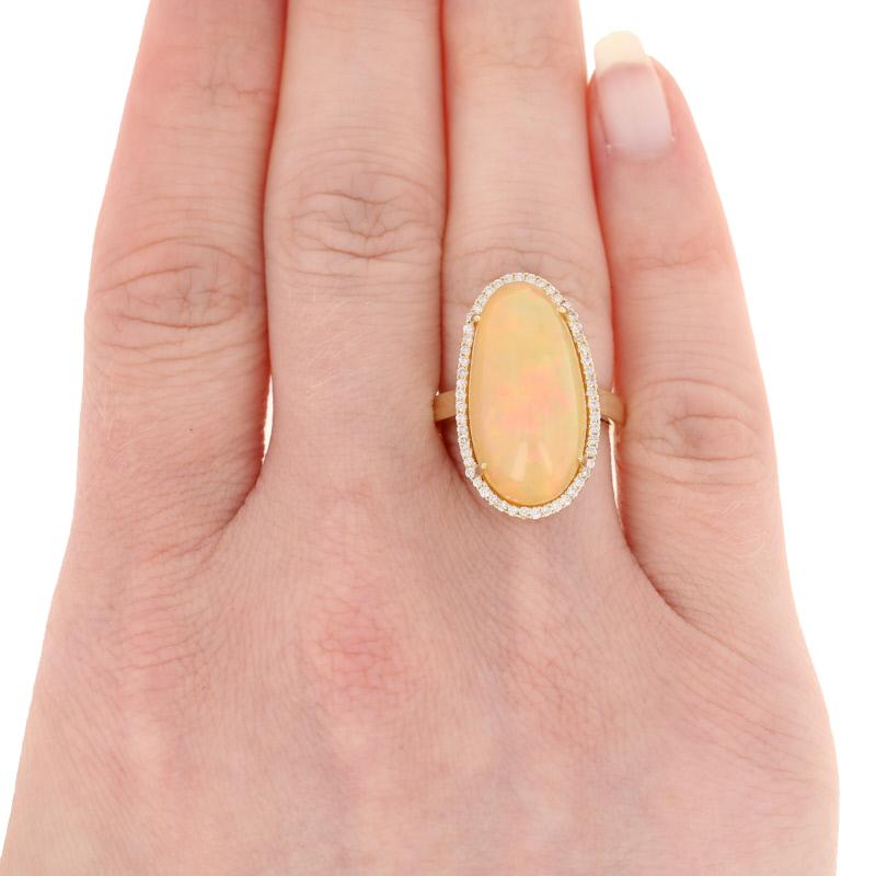 12.87 Carat Cabochon Cut Ethiopian Opal and Diamond Ring, 14k Yellow Gold Halo In New Condition In Greensboro, NC