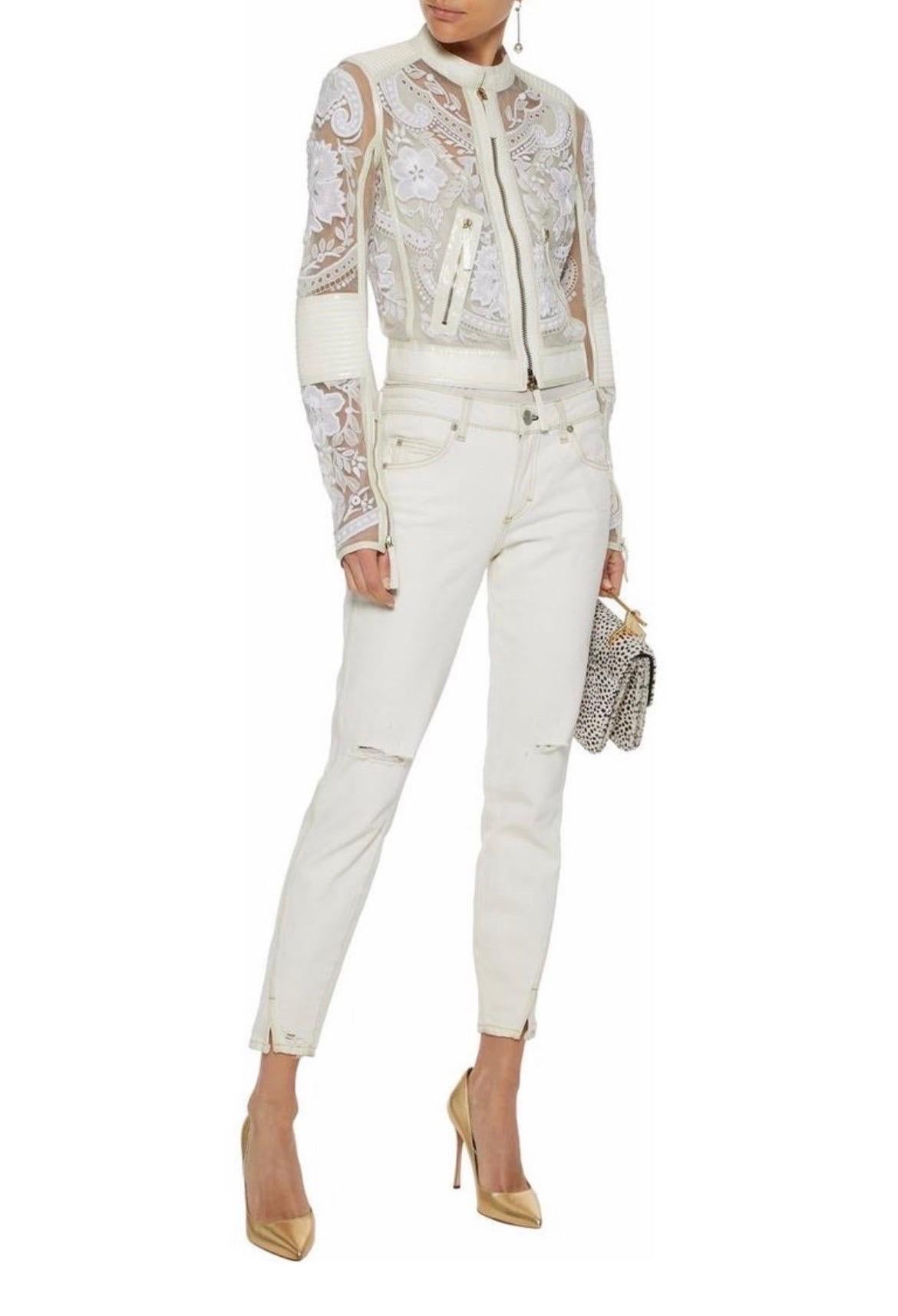Roberto Cavalli
Biker Jacket 
Tulle Embroidered Leather trims two-way zip fastening through front 
Zipped cuffs 
Zip pockets 
Non-stretchy fabric 
Mid-weight fabric 
Made in Italy
Retail $13,710.00
IT Size 42 - US 6
New, with tags
