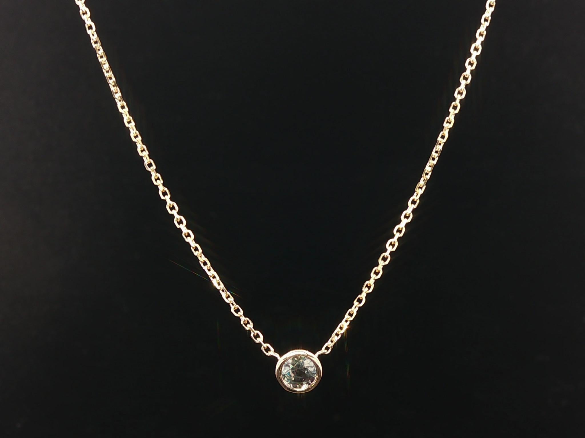--Stone(s):--
(1) Natural Genuine Alexandrite - Round Brilliant Cut - Bezel Set - Natural Color Change - Brazil - 3.4mm (approx.) - 0.24ct (exact)

Material: 14K Solid Yellow Gold
Weight: 1.91 Grams
Chain Type: Cable Chain
Chain Length: Adjustable