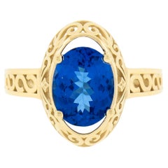14k Gold 2,0 Karat Violett Blauer ovaler Tansanit mit Schnörkeln Open Work Solitär Ring