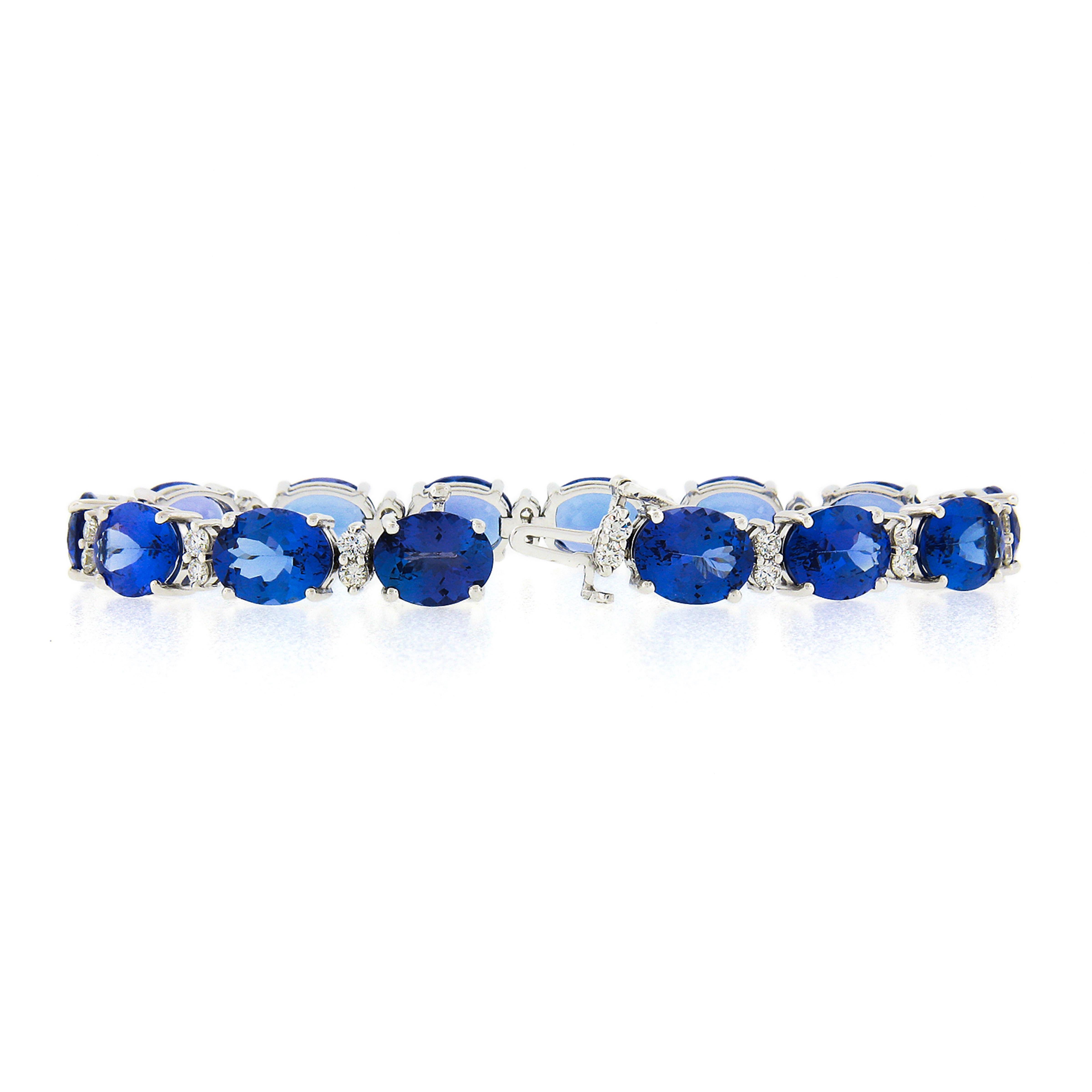 New 14k Gold 37.71ct Alternating Oval Tanzanite & Round Diamond Tennis Bracelet In New Condition For Sale In Montclair, NJ