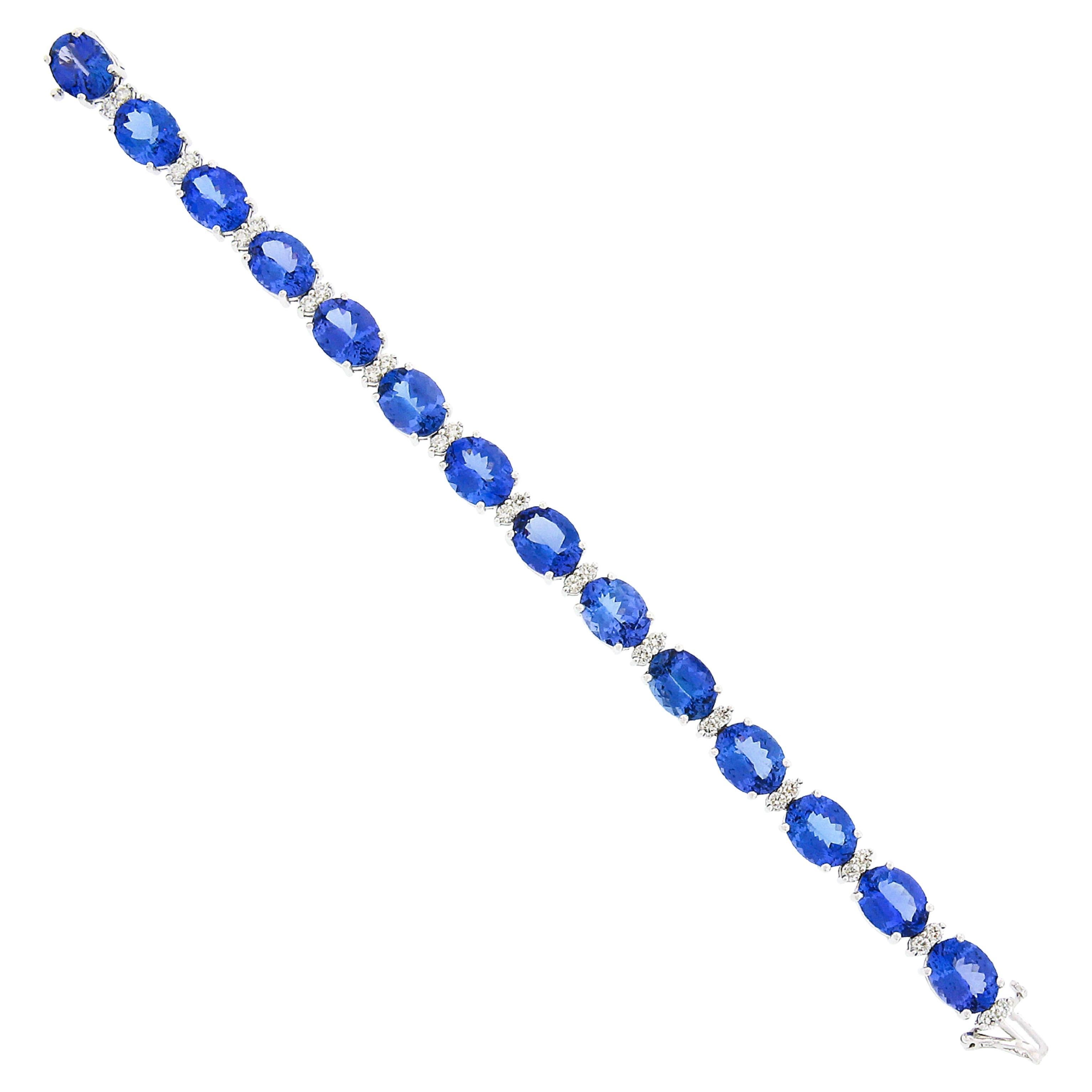 New 14k Gold 37.71ct Alternating Oval Tanzanite & Round Diamond Tennis Bracelet For Sale