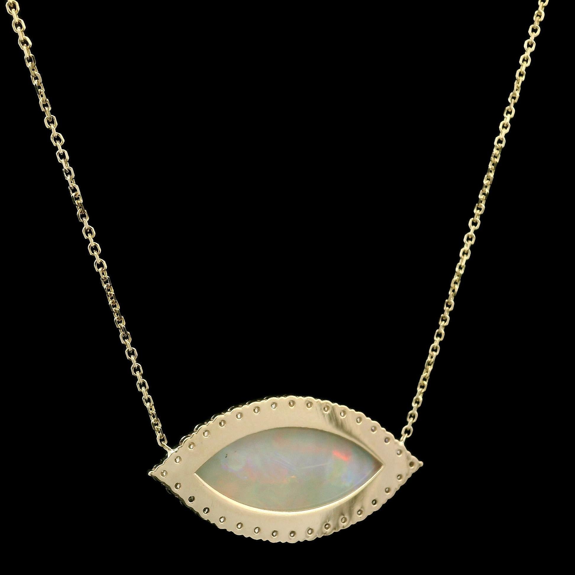 –Stone(s)–
(1) Natural Genuine Opal - Marquise Cabochon Cut - Prong Set - Big Face - White Base w/ Nice Play of Colors - 21.7x10.3mm - 4.25ct (exact)
Numerous Natural Genuine Diamond - Round Brilliant Cut - Pave Set - F/G Color - VS1/VS2 Clarity -