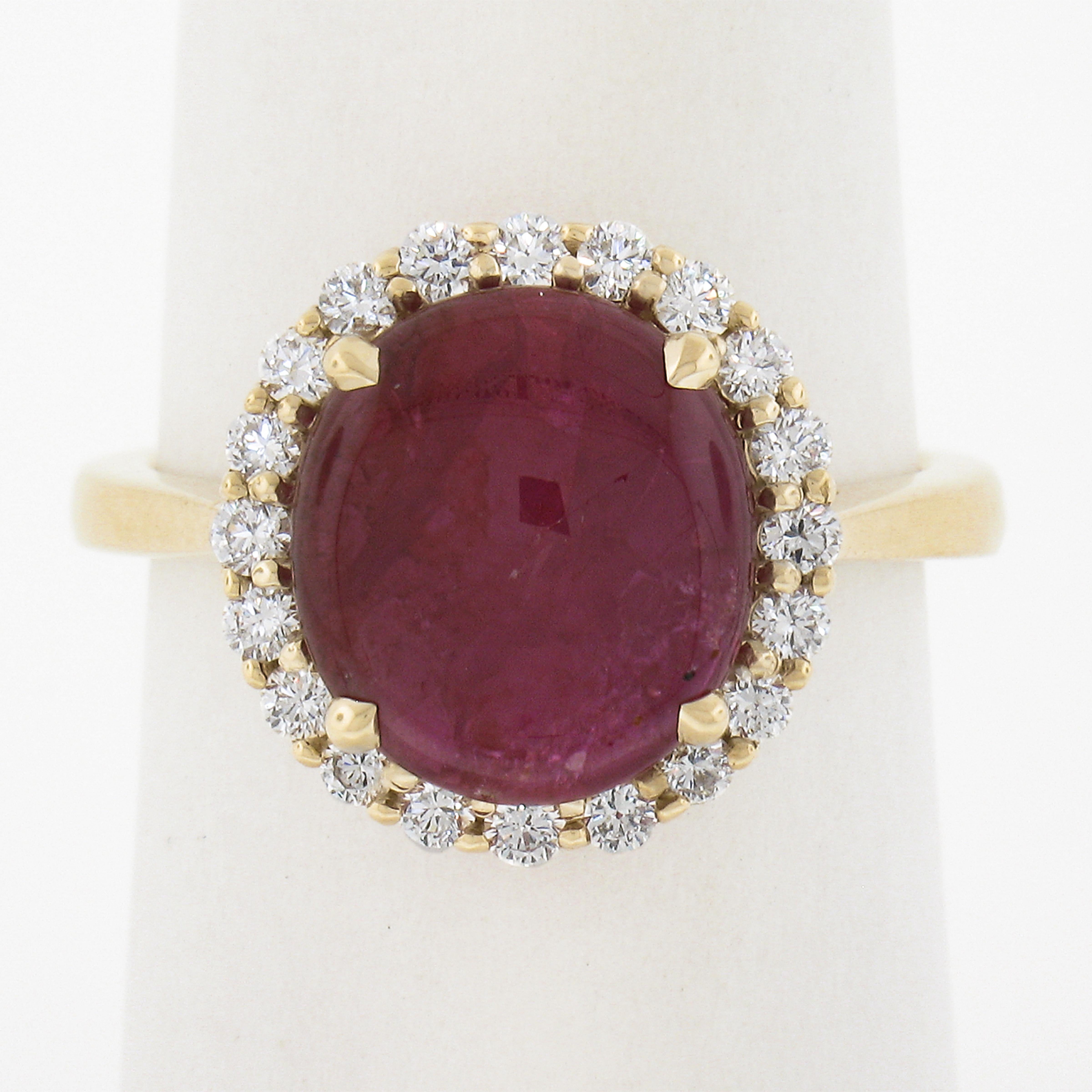 This ruby and diamond ring is well crafted in solid 14k yellow gold. The elegant halo cluster design is set with a GIA certified natural ruby has no heat treatment. It is surrounded by a halo of 20 fine quality round brilliant cut diamonds that