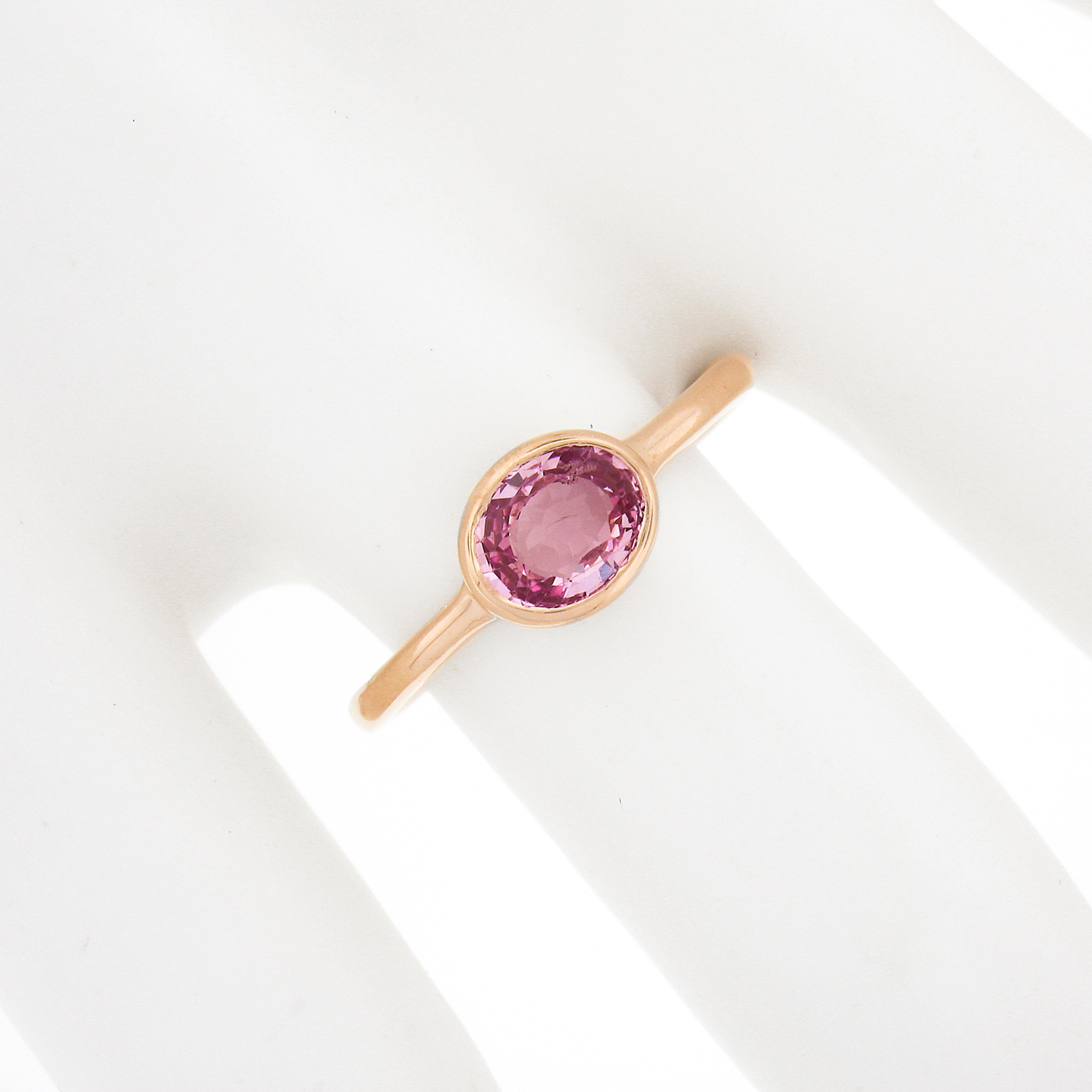 NEW 14k Rose Gold 1.29ctw GIA Oval Orangy Pink Sapphire Bezel Solitaire Ring Pour femmes en vente
