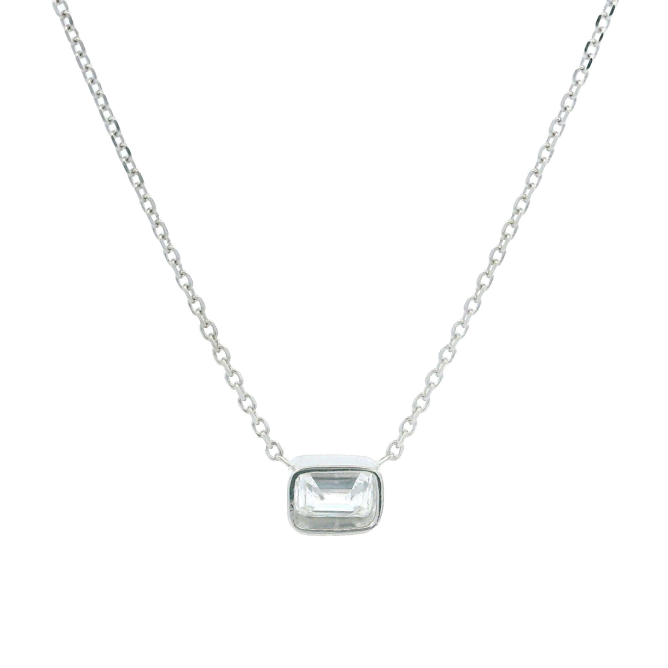 –Stone(s)–
(1) Natural Genuine Diamond - Emerald Cut - Bezel Set - G Color - VS2 Clarity - 4.68 x 3.25mm (approx.) - 0.33ctw (approx.)

Material: Solid 14k White Gold
Weight: 1.6 Grams
Chain Type: Adjustable at 16