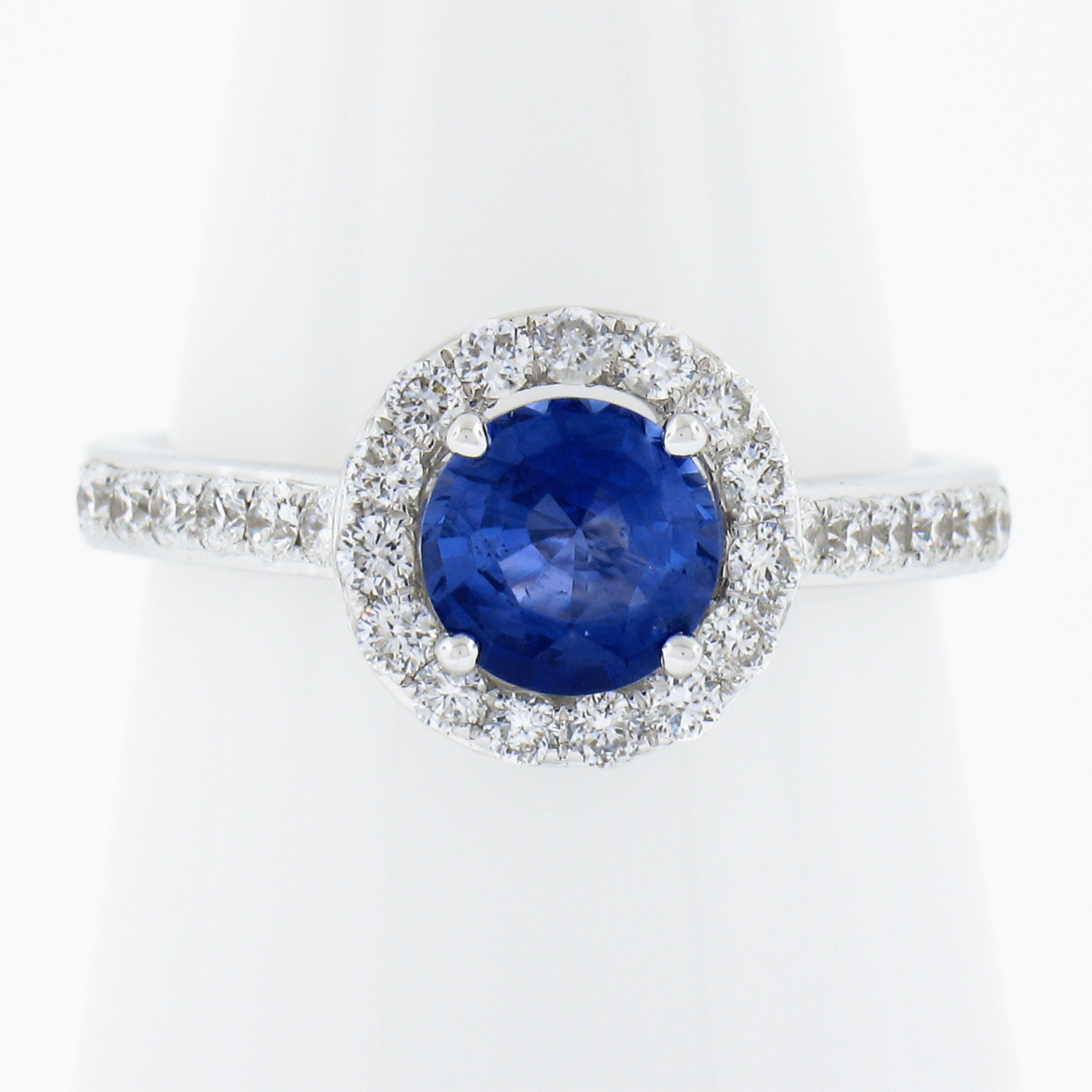 --Stone(s):--
(1) Natural Genuine Sapphire - Round Brilliant Cut - Prong Set - Blue Color -1.11ct (exact - certified)
** See Certification Details Below for Complete Info **
(41) Natural Genuine Diamonds - Round Brilliant Cut - Pave Set - G-I Color