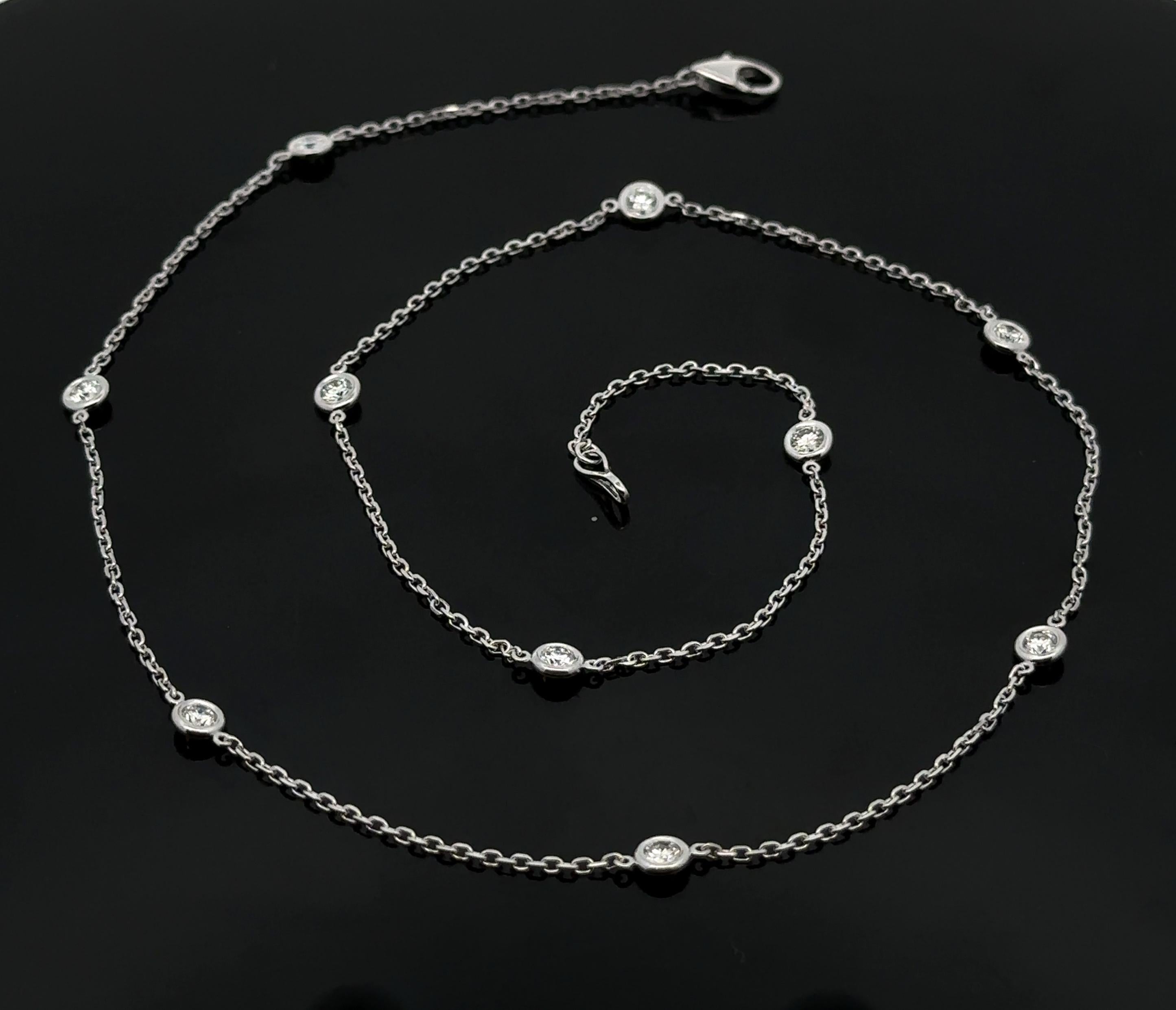 --Pietre: --
(10) Diamanti naturali autentici - taglio rotondo a brillante - incastonati a brunire - colore F/G - purezza VS1/VS2 - 1,0ctw (esatto)

Materiale: Oro bianco massiccio 14k
Peso: 3,6 grammi
Tipo di catena: A Link
Lunghezza della catena: