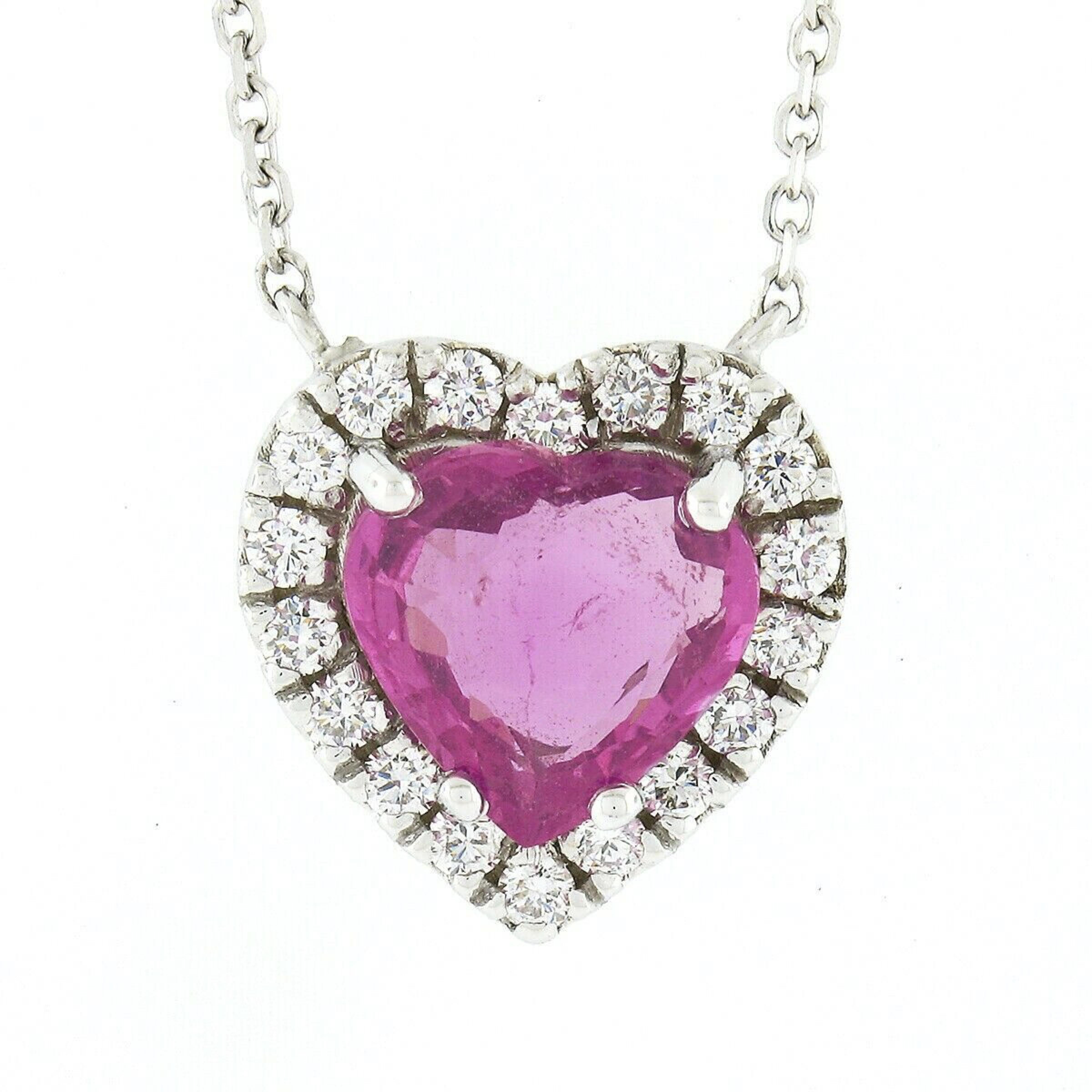 Here we have a gorgeous, brand new and custom made pendant necklace crafted in solid 14k white gold and features a lovely heart design constructed from a very fine, GIA certified, heart brilliant cut pink sapphire solitaire neatly set at the center