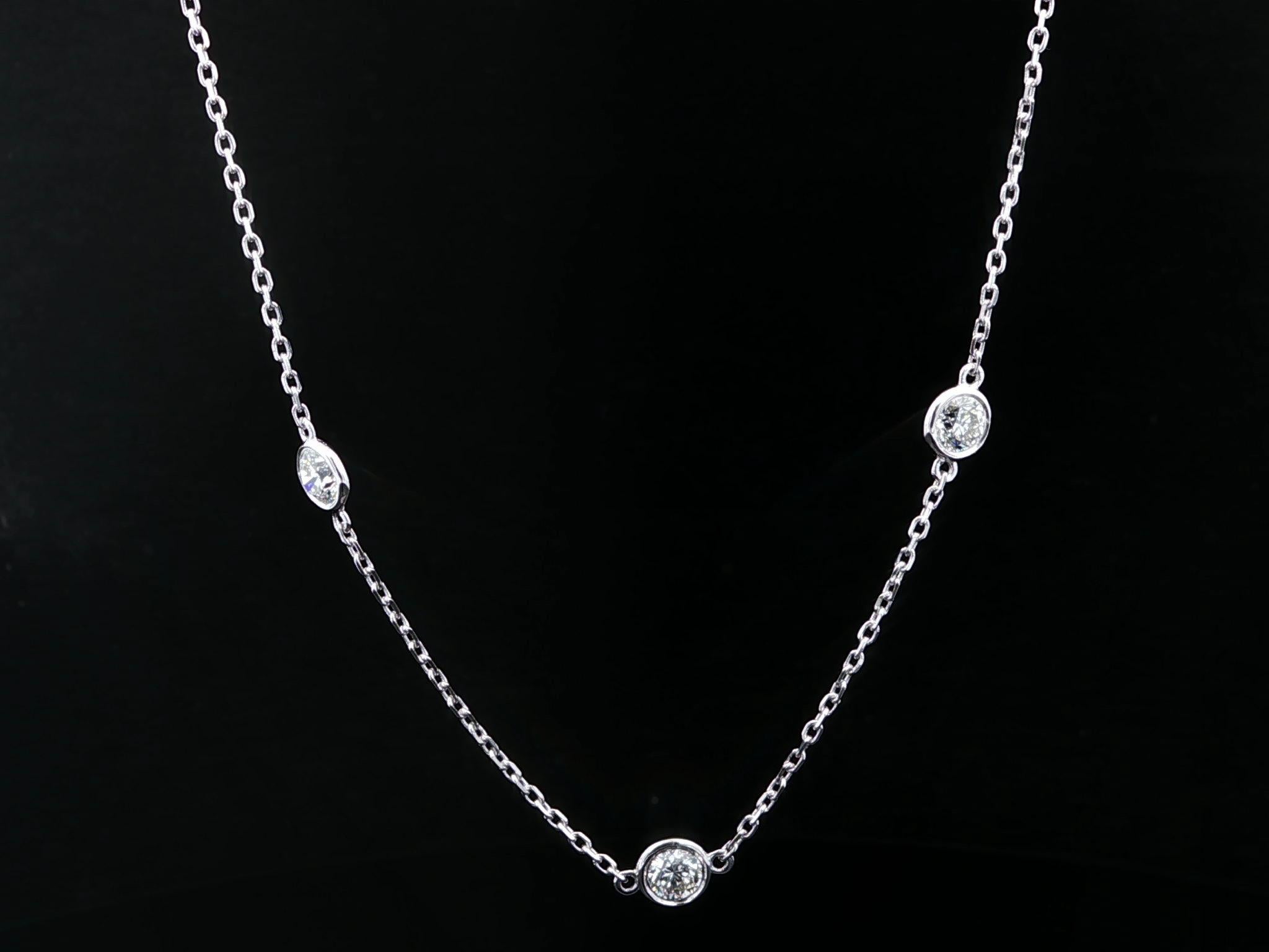 --Pietre: --
(10) Diamanti naturali autentici - taglio rotondo brillante - incastonati - colore H/I - purezza VS1/VS2 - 3,04ctw (esatto)

Materiale: Oro bianco massiccio 14k
Peso: 4.53 grammi
Tipo di catena: A Link
Lunghezza della catena: 18 pollici