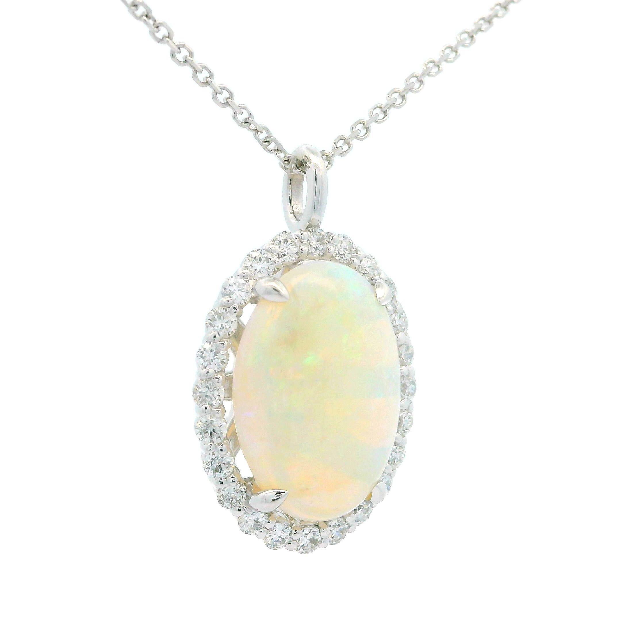 --Stone(s):--
(1) Natural Genuine Opal - Oval Cabochon Cut - Prong Set - White Base w/ Outstanding Green, Blue, and Orange Play - 14.7x10.5mm (approx.)- 3.93ct (exact)
(24) Natural Genuine Diamonds - Round Brilliant Cut - Prong Set - VS1/VS2 Clarity