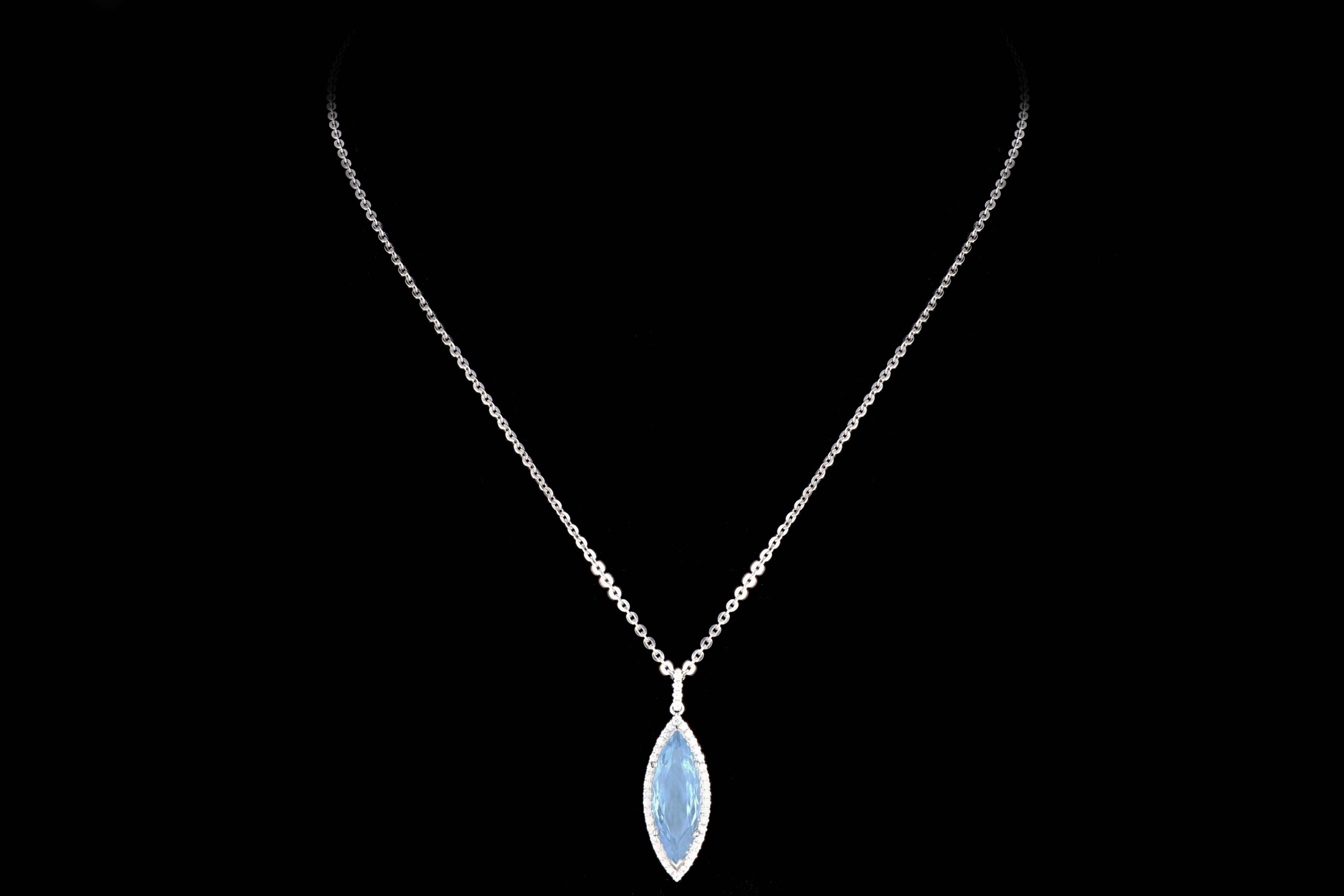 Era: New

Composition: 14K White Gold

Primary Stone: Aquamarine

Carat Weight: 4.47 Carats

Accent Stone: Round Brilliant Cut Diamond

Carat Weight: .24 Carats

Color: G-H

Clarity: Vs1/2

Total Carat Weight: 4.71 Carats

Necklace Weight: 4.4 DWT