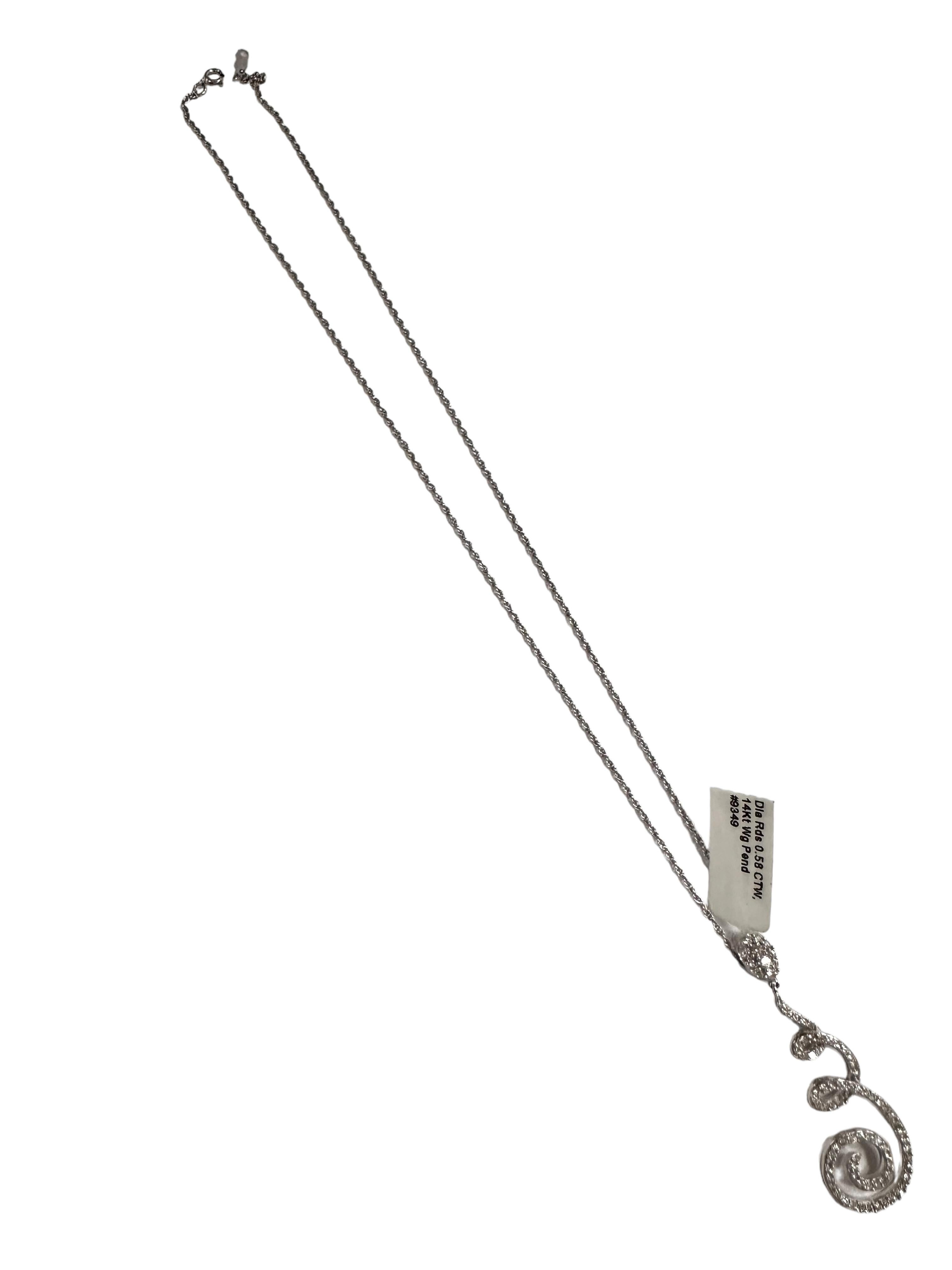 This is such a beautiful diamond pendant.  It's very classy.  It's .58 cts and the pave diamonds are H in color and SI in clarity.  It is on a beautiful 14k white gold chain that measures 18 inches and is marked on the spring ring closure.  It is