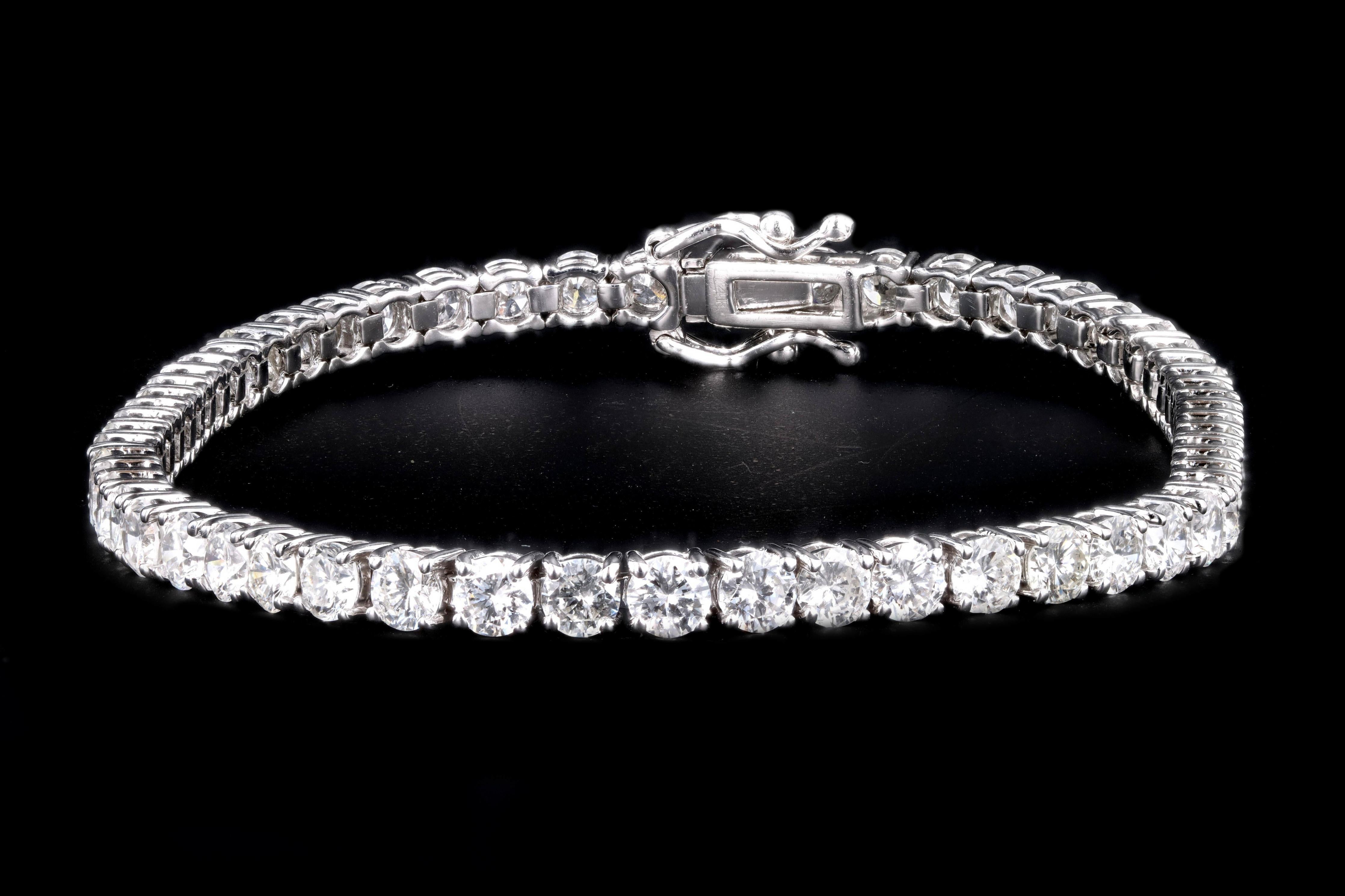 Era: New

Composition: 14K White Gold

Primary Stone: Round Brilliant Cut Diamonds

Total Carat Weight: Approximately 6.64 Carats 

Color/Clarity: G-H / SI1-2

Bracelet Length: 7 Inches

Bracelet Weight: 9.2 Grams 