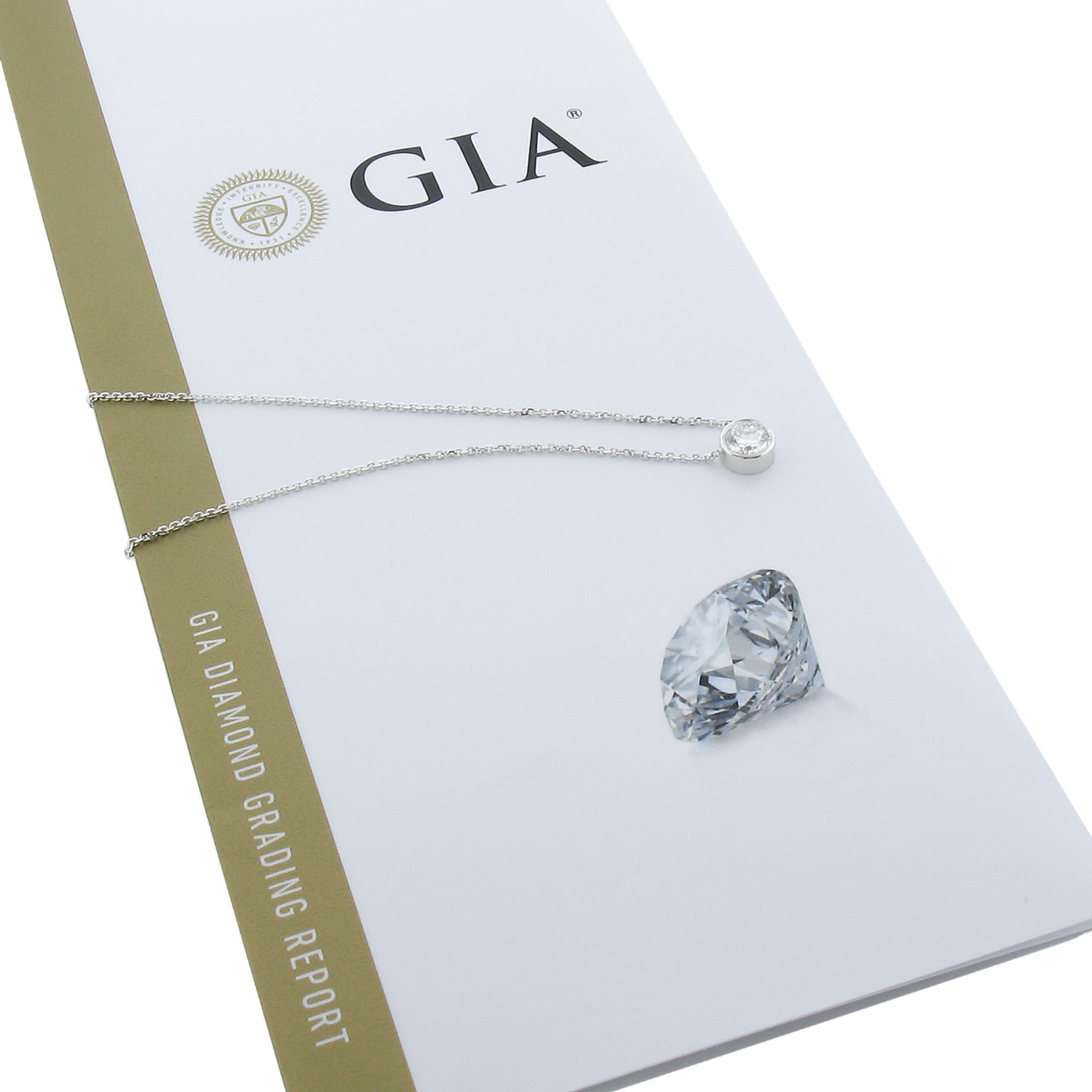 Here we have a gorgeous, elegant, brand new, diamond pendant necklace crafted in solid 14k white gold. The necklace features a fine quality, GIA certified, round brilliant cut diamond solitaire neatly bezel set at the center. This stunning diamond