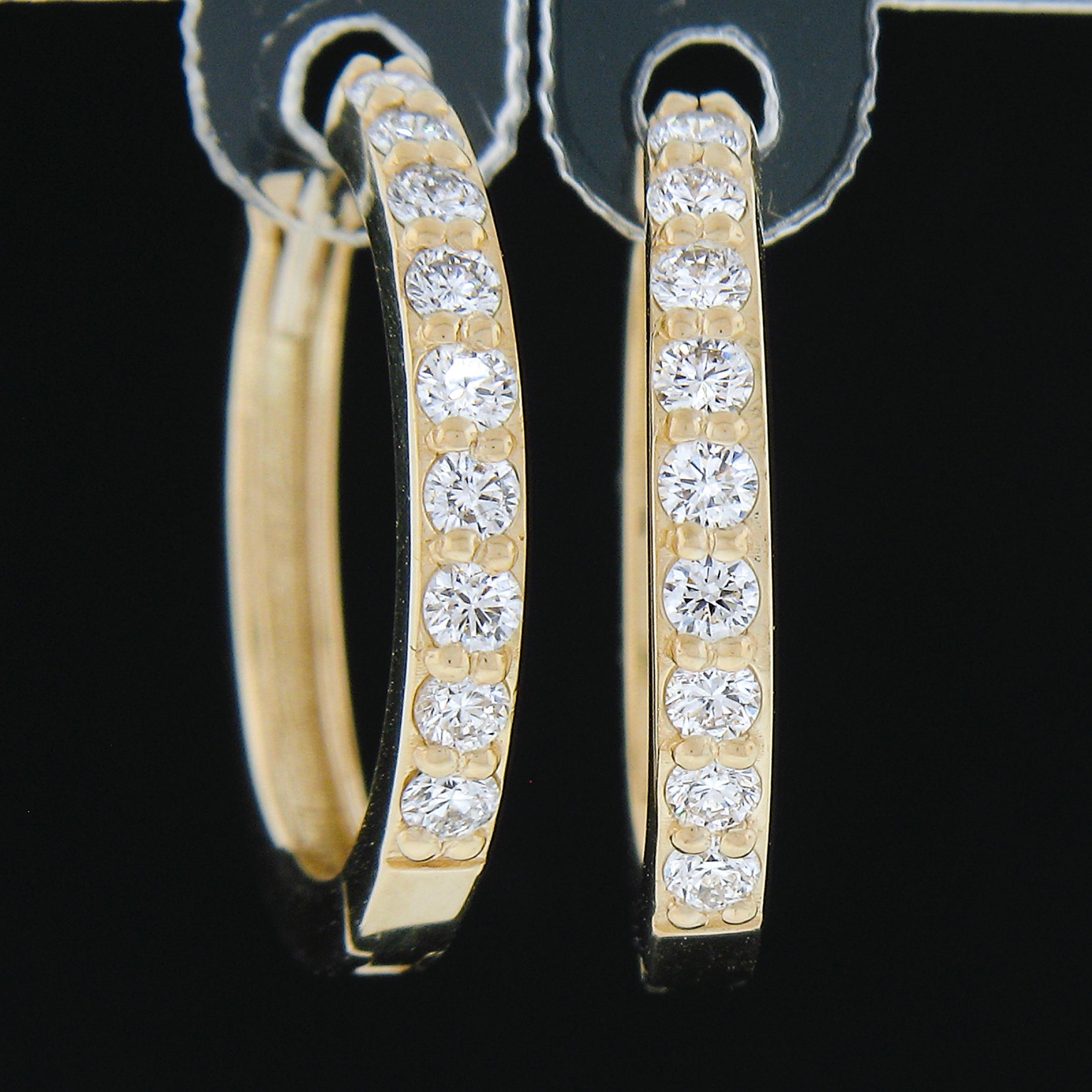 --Pietre: --
(18) Diamanti naturali autentici - Taglio rotondo Brilliante - Incastonati - Colore F/G - Purezza VS1/VS2
Peso totale dei carati:	0,32 (esatto)

Materiale: Oro giallo massiccio 14k
Peso: 2,36 grammi
Fondello: Chiusura a scatto (sono